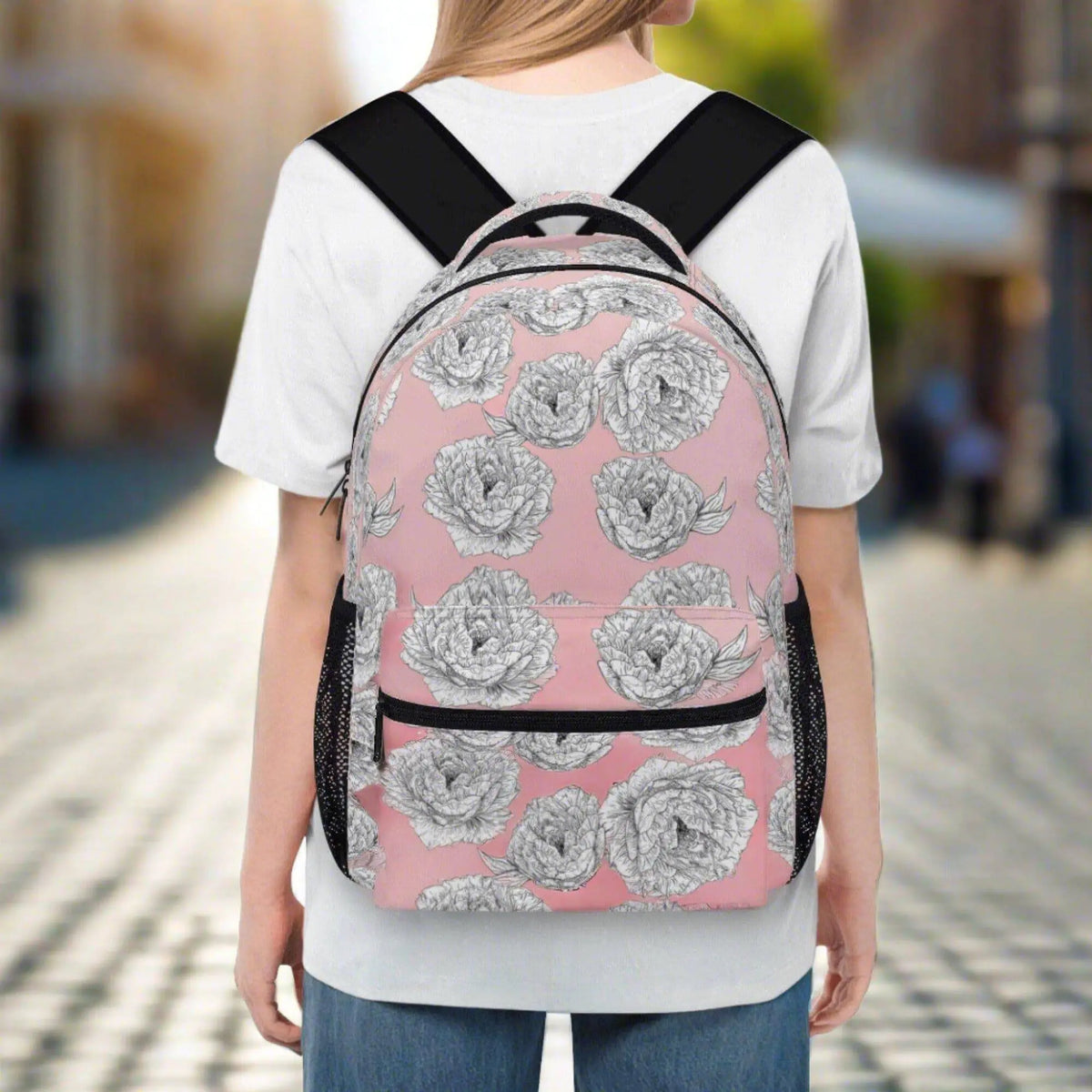 Pink Peony Flower backpack by Winks Design Studio, LLC featuring a vibrant floral print on a stylish backpack.