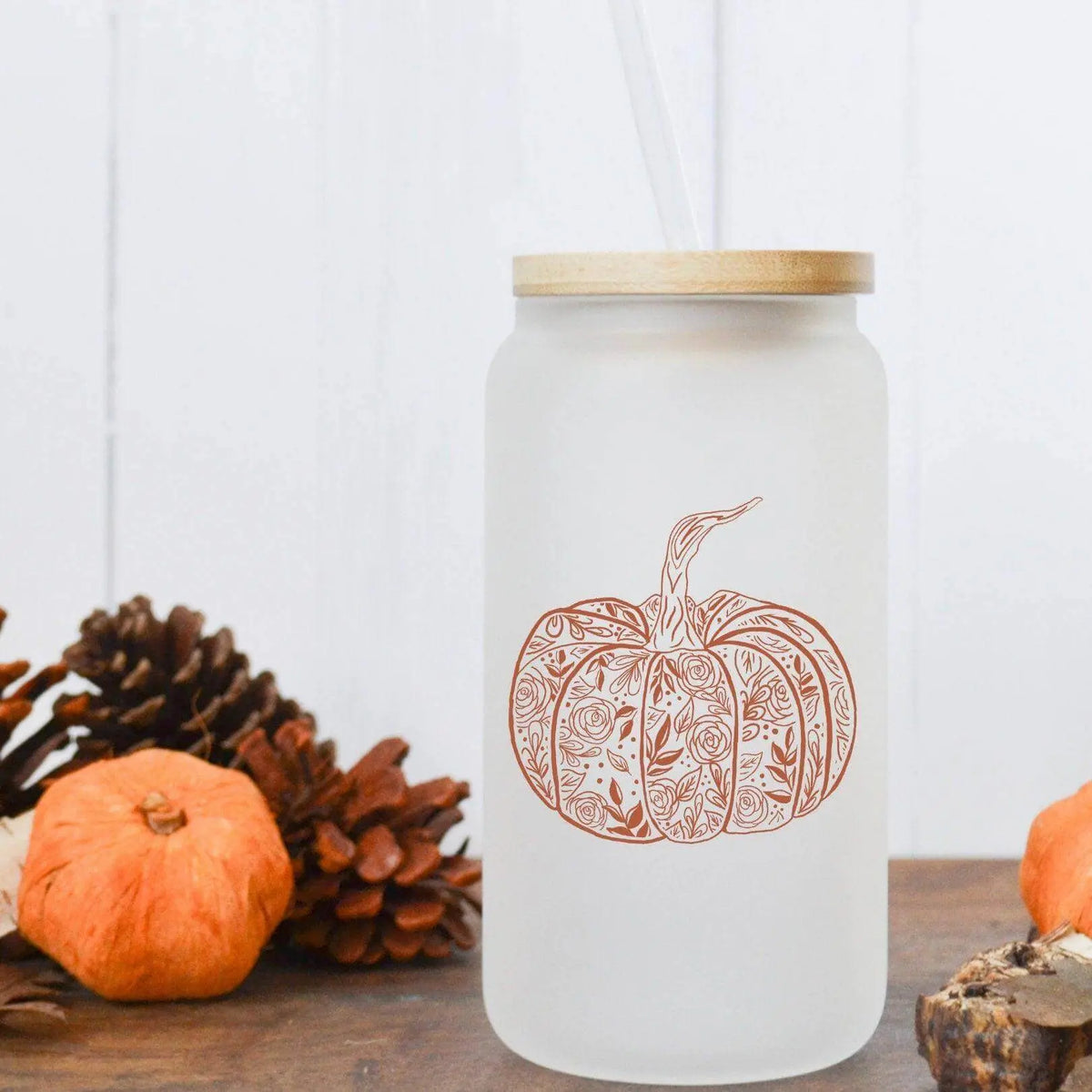 16oz Flower Pumpkin glass beer can by Winks Design Studio featuring a floral pumpkin design on clear glass.