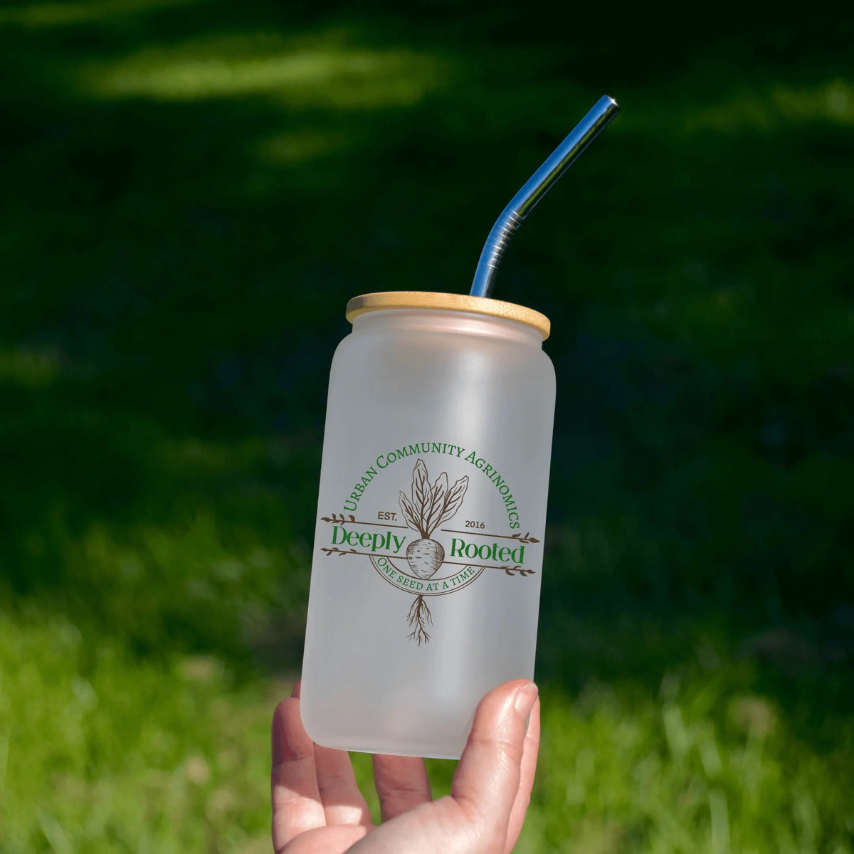 Winks Design Studio LLC UCAN frosted beer glass with etched design, clear glass with a frosted finish, ideal for beverages.