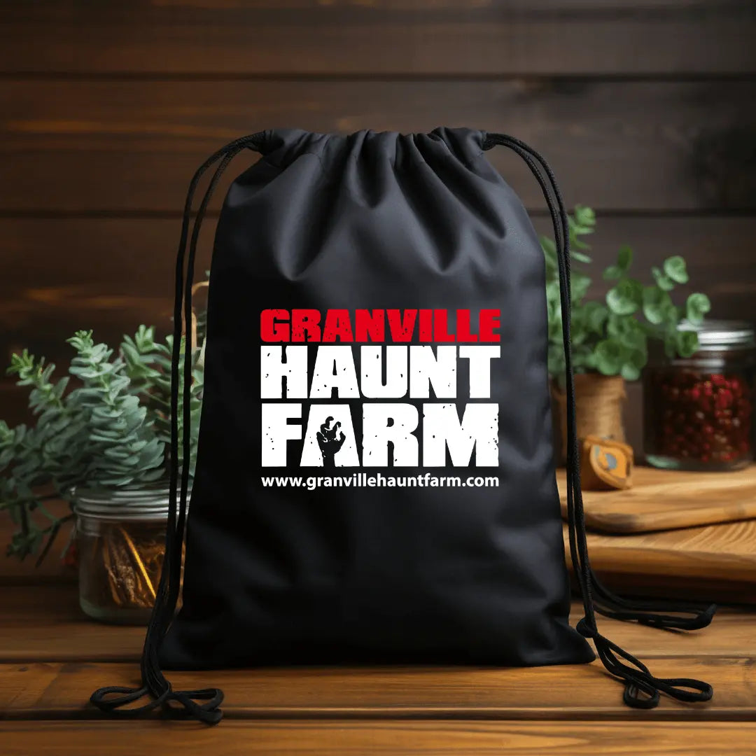 Winks Design Studio LLC Granville Haunt Farm drawstring cinch bag with Halloween-themed design and adjustable straps.