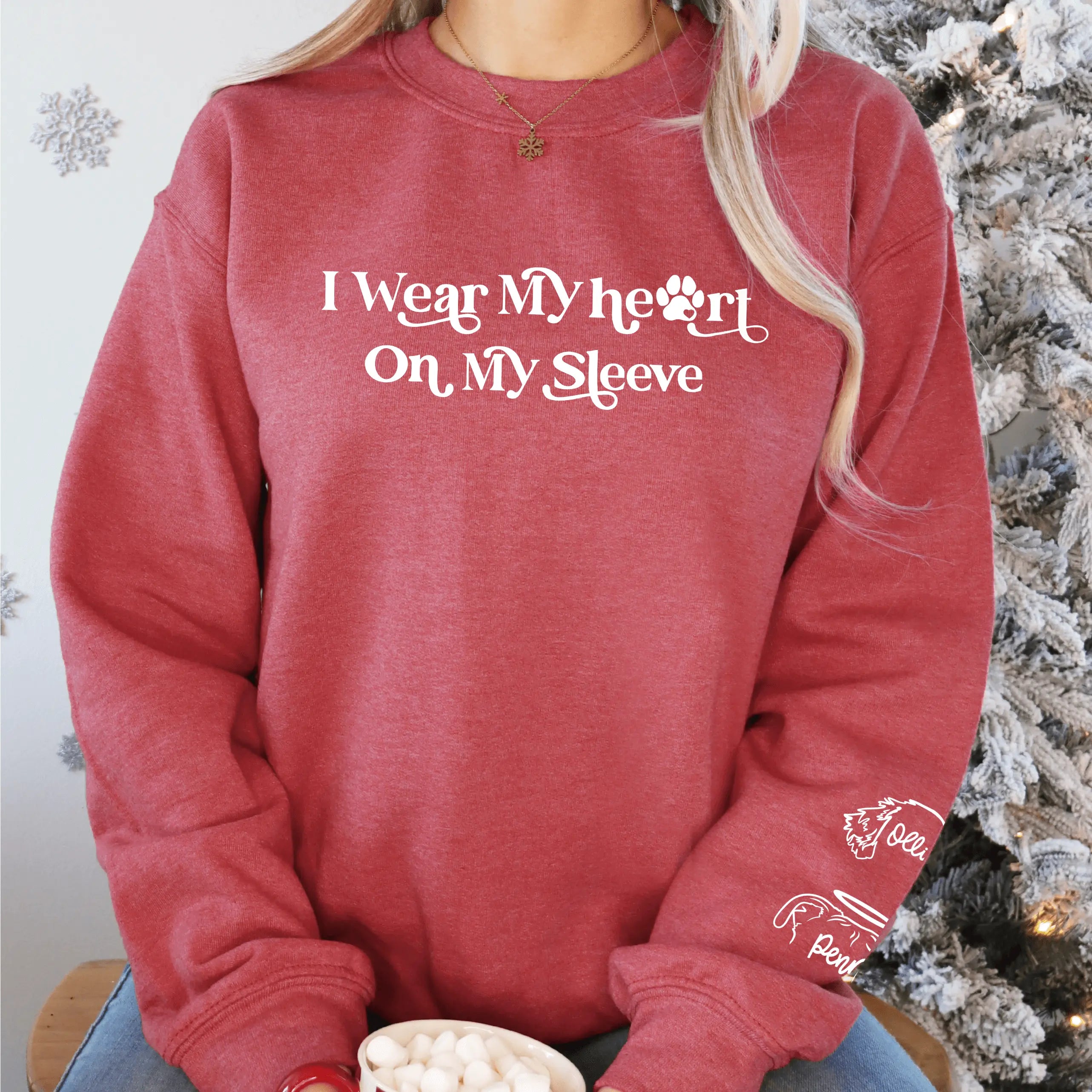 Heather royal crewneck sweatshirt by Winks Design Studio, LLC with "I Wear My Heart on My Sleeve" printed design.
