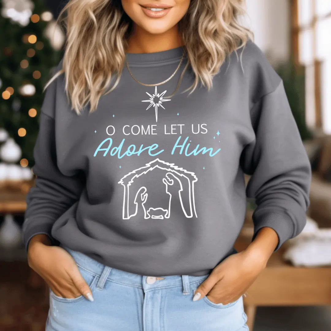 Winks Design Studio LLC O Come Let Us Adore Him Nativity crewneck sweatshirt featuring festive holiday design and soft fabric.