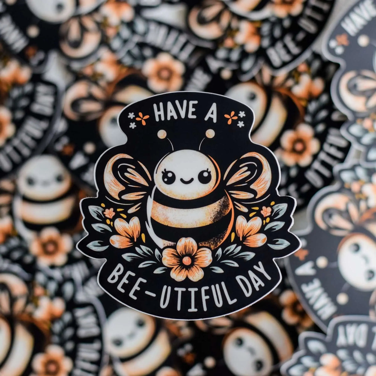 Winks Design Studio LLC Have A Bee-U-tiful Day decorative sticker featuring a cheerful bee design for decorating or crafting.