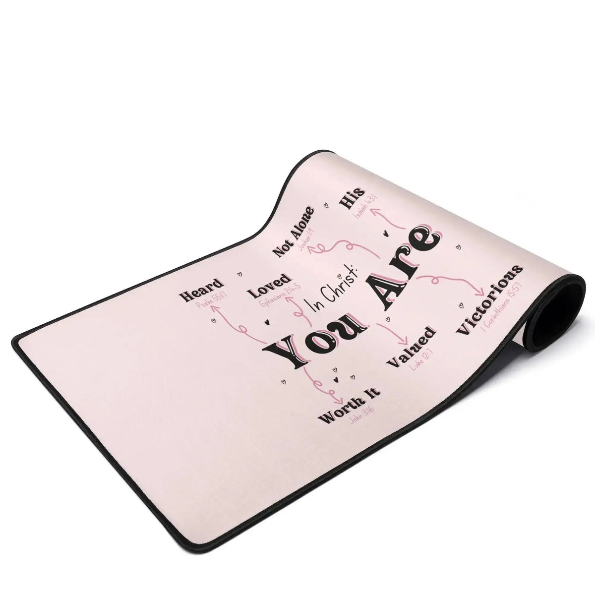 Winks Design Studio LLC In Christ You Are desk mat with inspirational Christian quote and decorative design on a smooth surface.