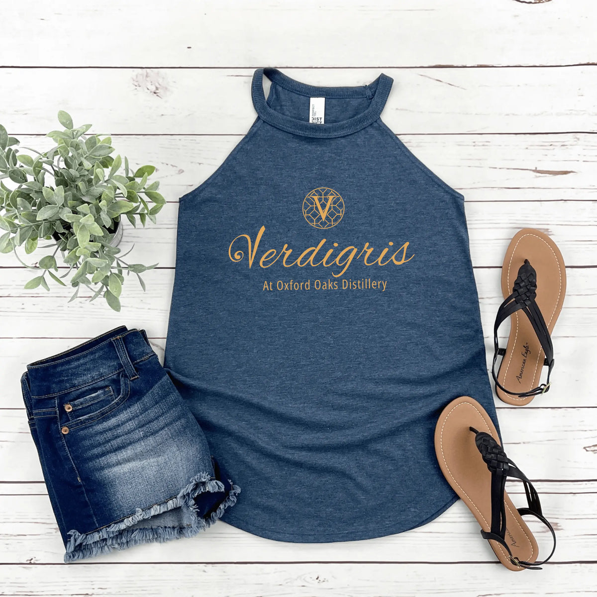 Navy blue verdigris halter top by Winks Design Studio, LLC, featuring a stylish neckline and lightweight fabric.