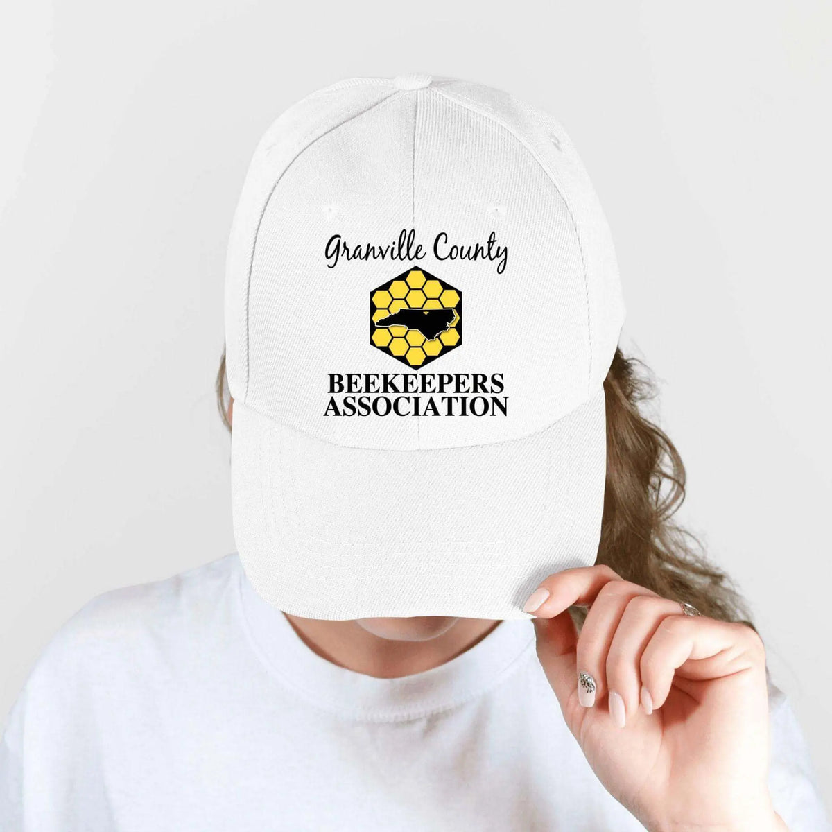 Black GCBA Twill Hat by Winks Design Studio, LLC, featuring a classic structured design and adjustable strap.