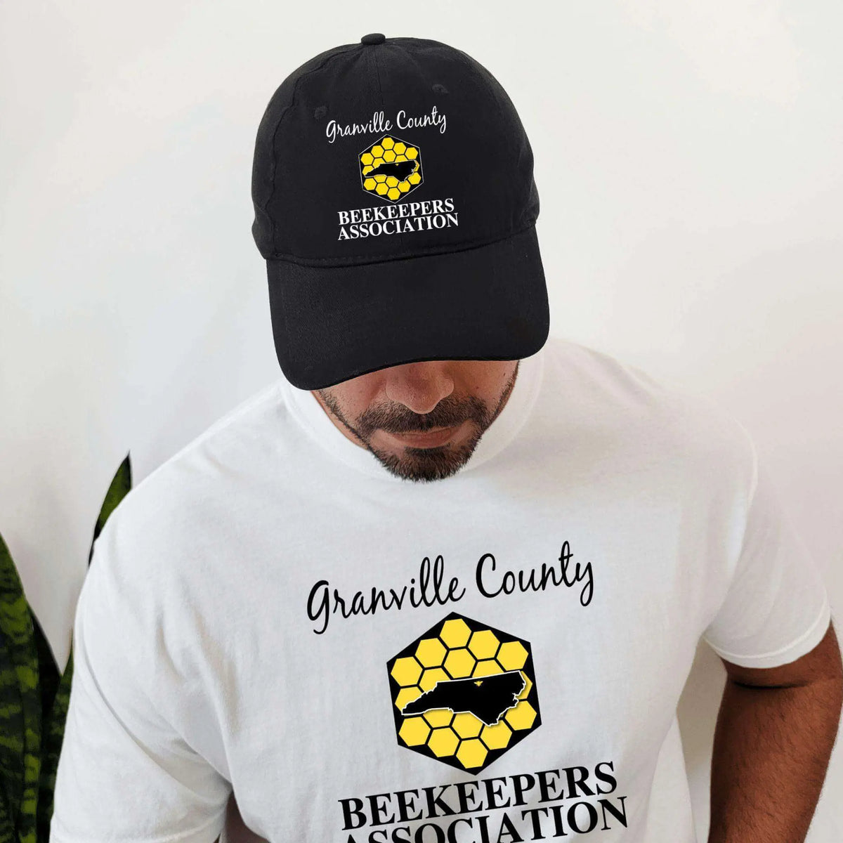 Black GCBA Twill Hat by Winks Design Studio, LLC, featuring a classic hat with a structured brim and stylish design.