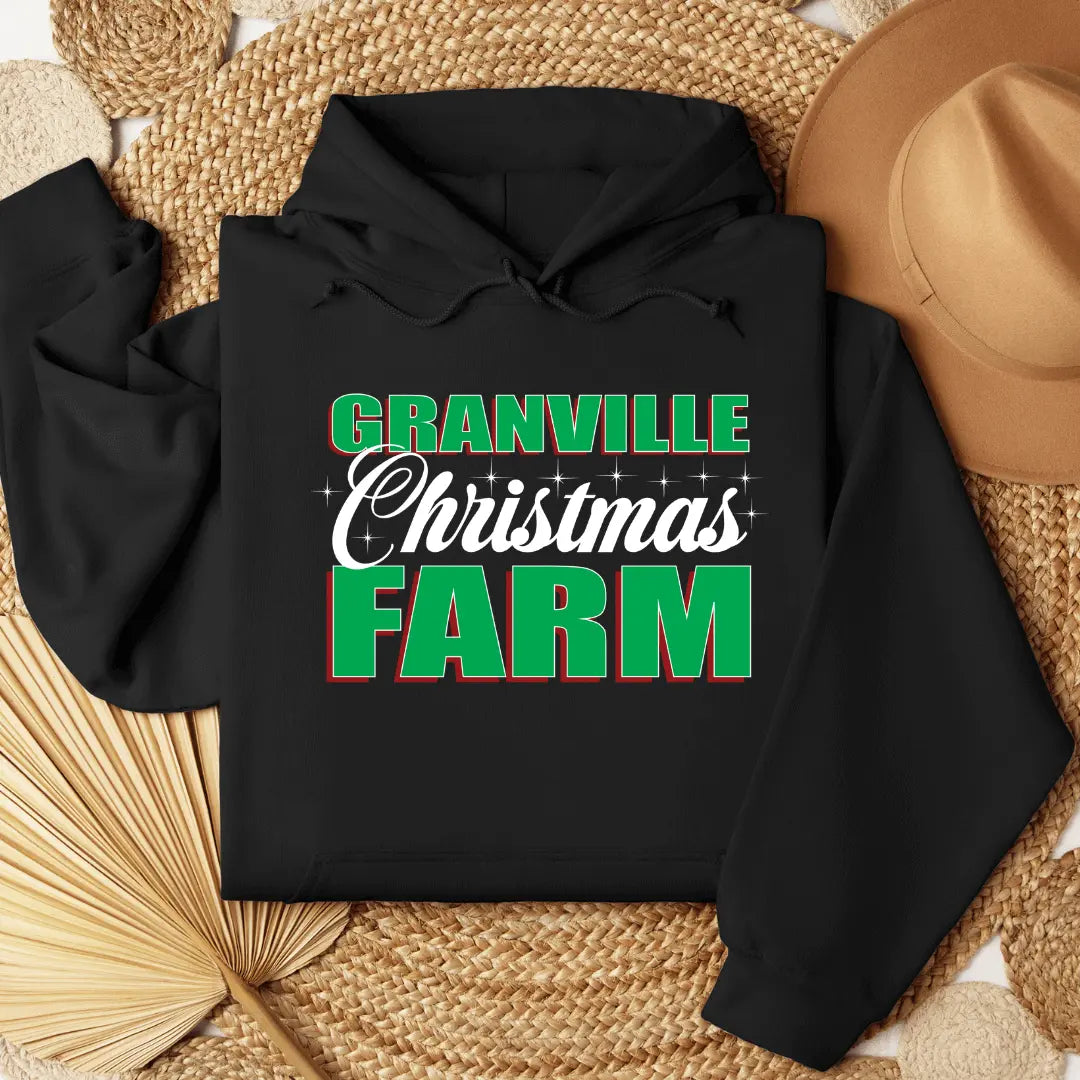 Black Granville Christmas Farm front pouch hoodie by Winks Design Studio, LLC featuring festive holiday farm design.