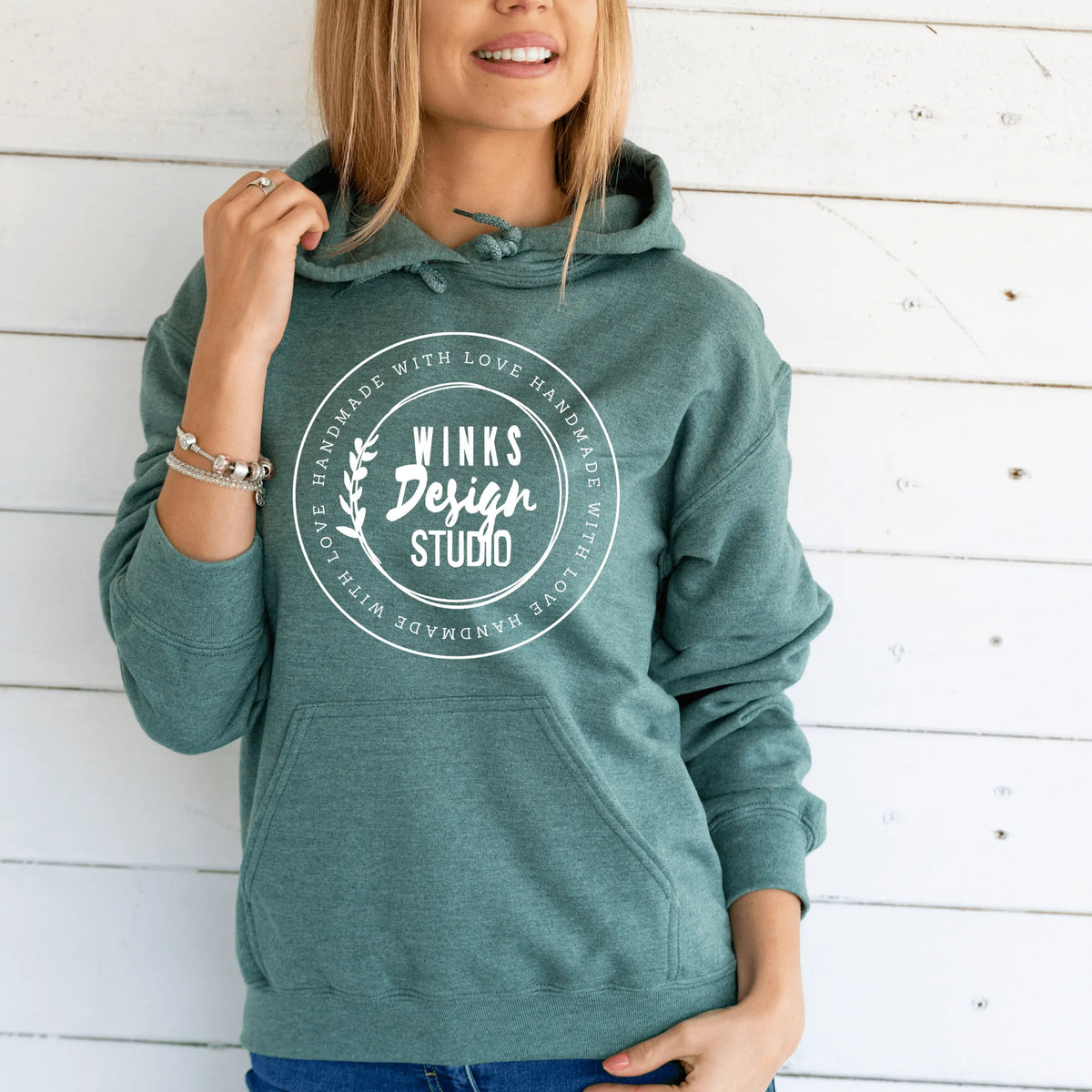 Sand-colored Winks Design Studio hoodie with front pouch and WDS logo on the chest, featuring a cozy hoodie design.