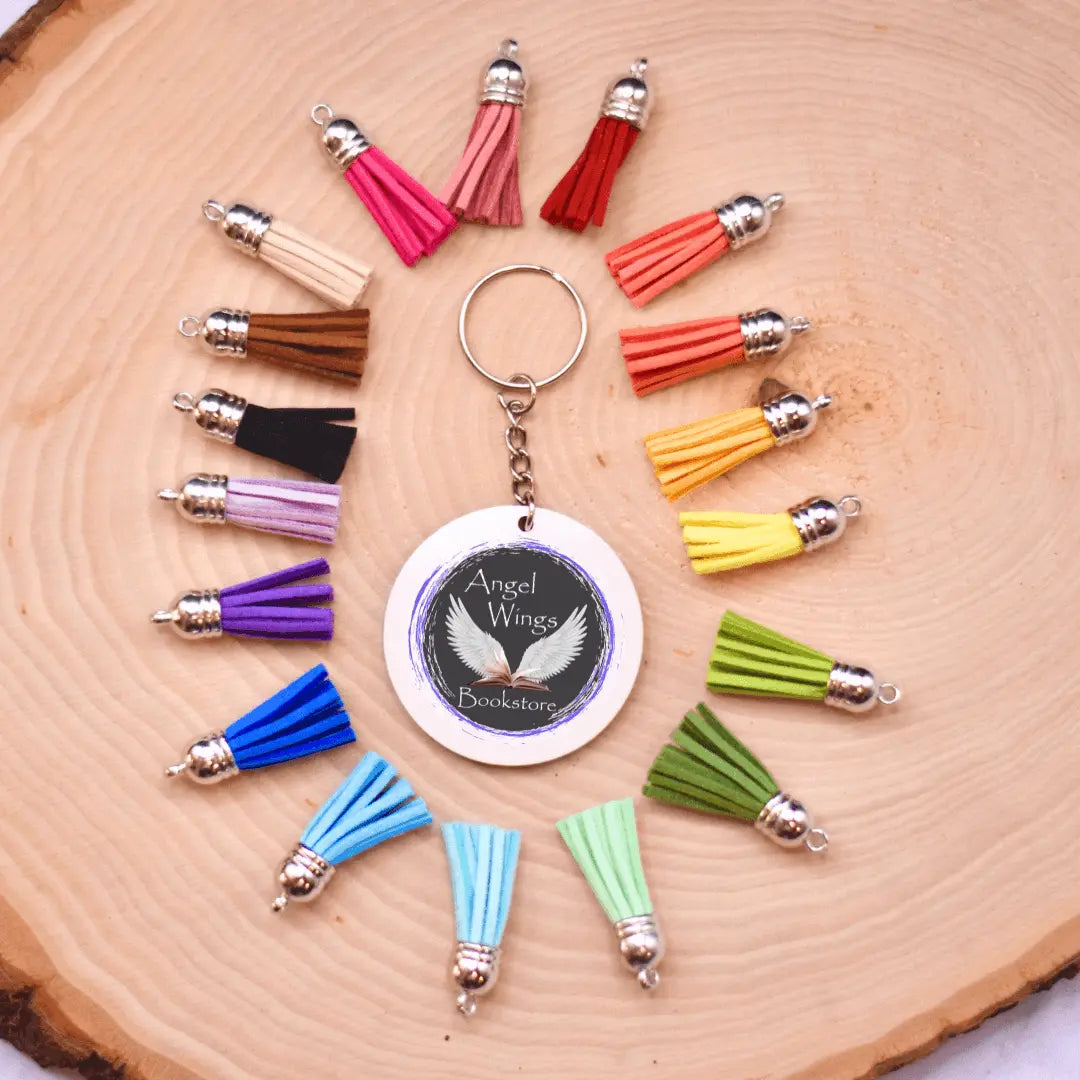 Winks Design Studio LLC angel wings bookstore keychain featuring detailed metal wings and a small book charm for book lovers.