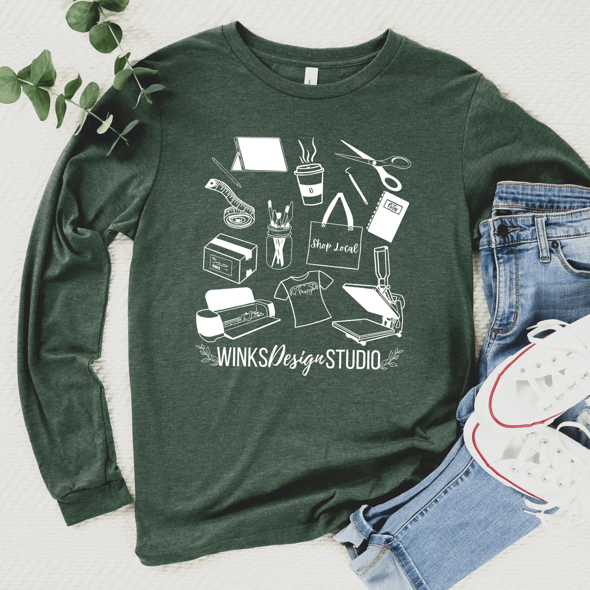 Navy long sleeve shirt with Winks Design Studio LLC pattern, featuring a stylish and comfortable design.