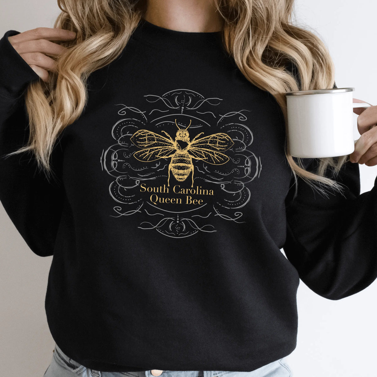 Winks Design Studio LLC SCBA South Carolina Queen Bee long sleeve shirt showing a bee graphic and state outline on a white background.