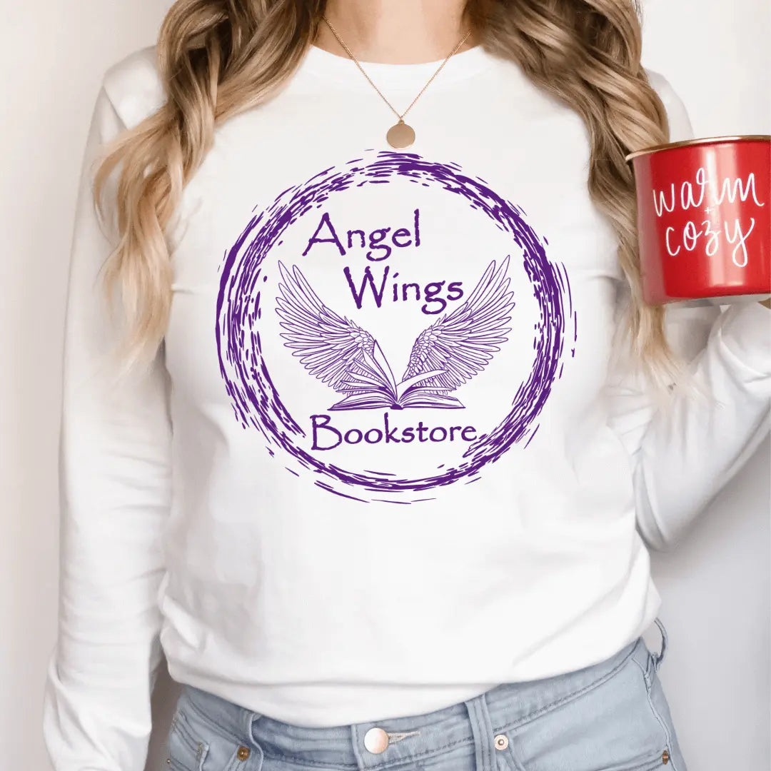 White long sleeve shirt with angel wings bookstore circular design by Winks Design Studio, LLC, shown on a small-sized model.