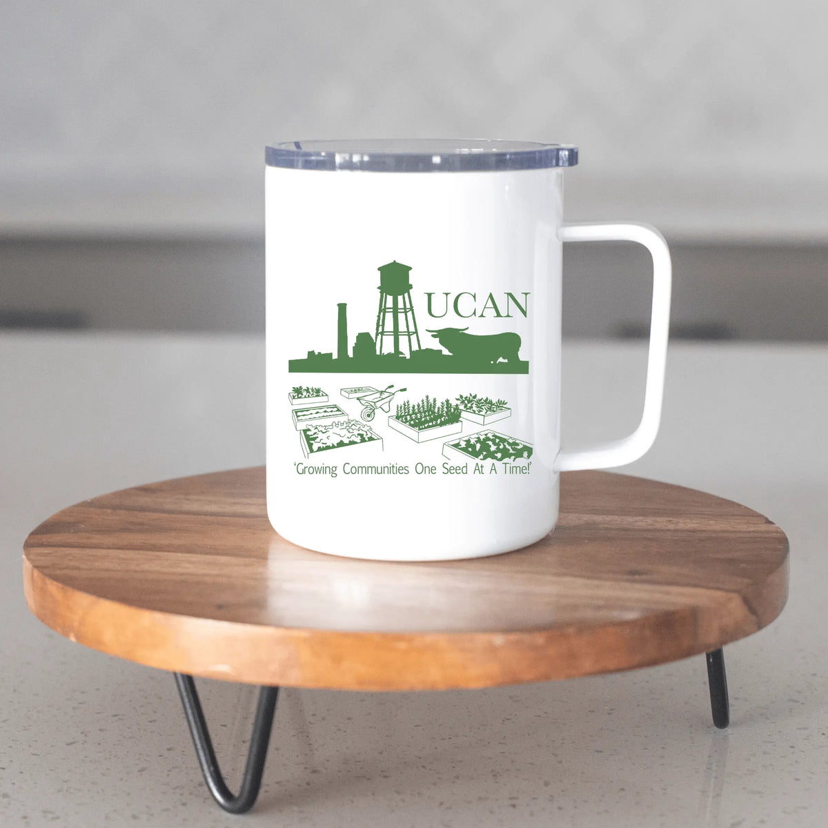 Winks Design Studio LLC UCAN 13oz insulated stainless steel mug with a sleek metal design and ergonomic handle.