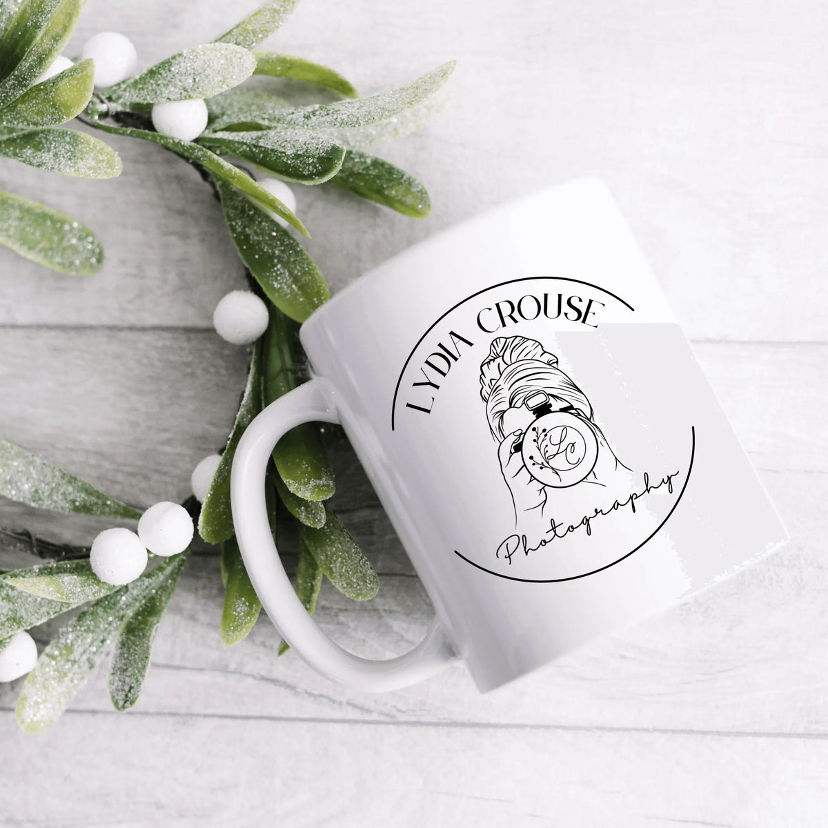 Lydia Crouse ceramic mug by Winks Design Studio, LLC, featuring a detailed artistic design on a white ceramic mug.