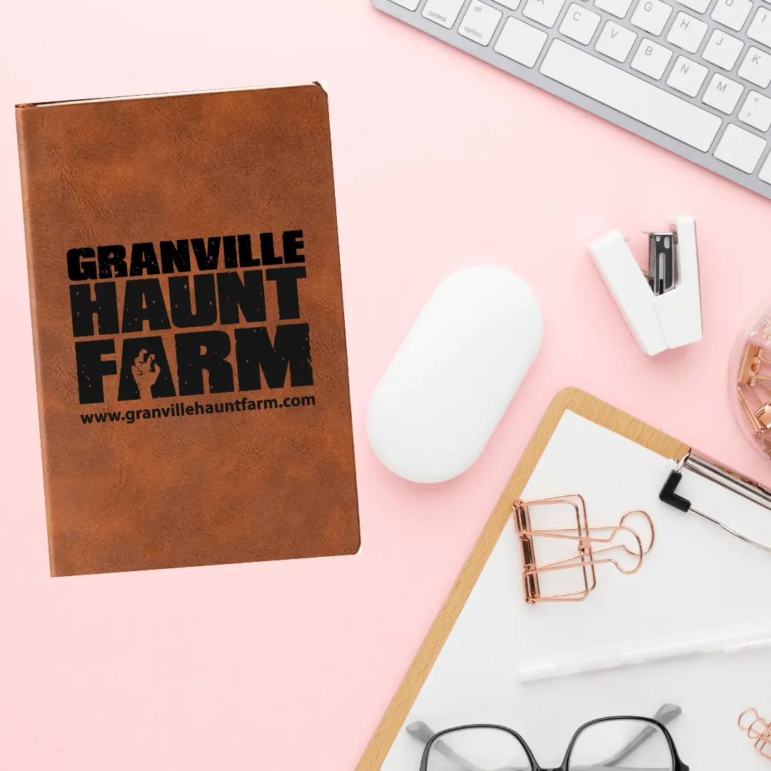 Granville Haunt Farm leather journal by Winks Design Studio, LLC, featuring a rustic leather cover and vintage-style design.