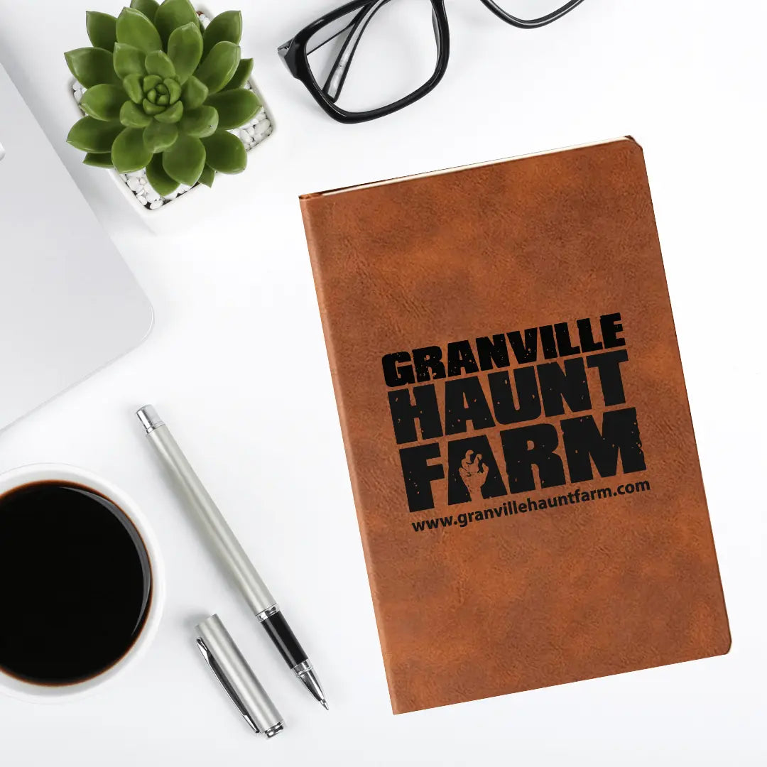 Leather journal from Winks Design Studio, Granville Haunt Farm, featuring a rugged cover and classic notepad style.