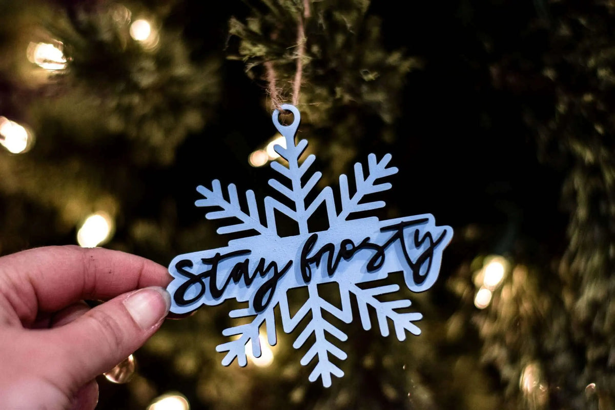 Stay Frosty Christmas ornament by Winks Design Studio, LLC, featuring a festive design perfect for holiday decorating.