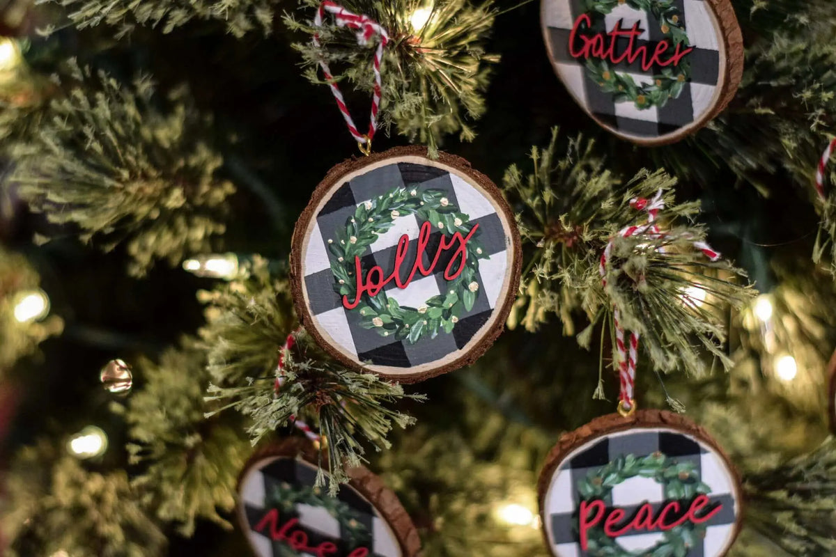 Customizable Christmas wreath ornament by Winks Design Studio, LLC, featuring festive holiday design and personalized details.
