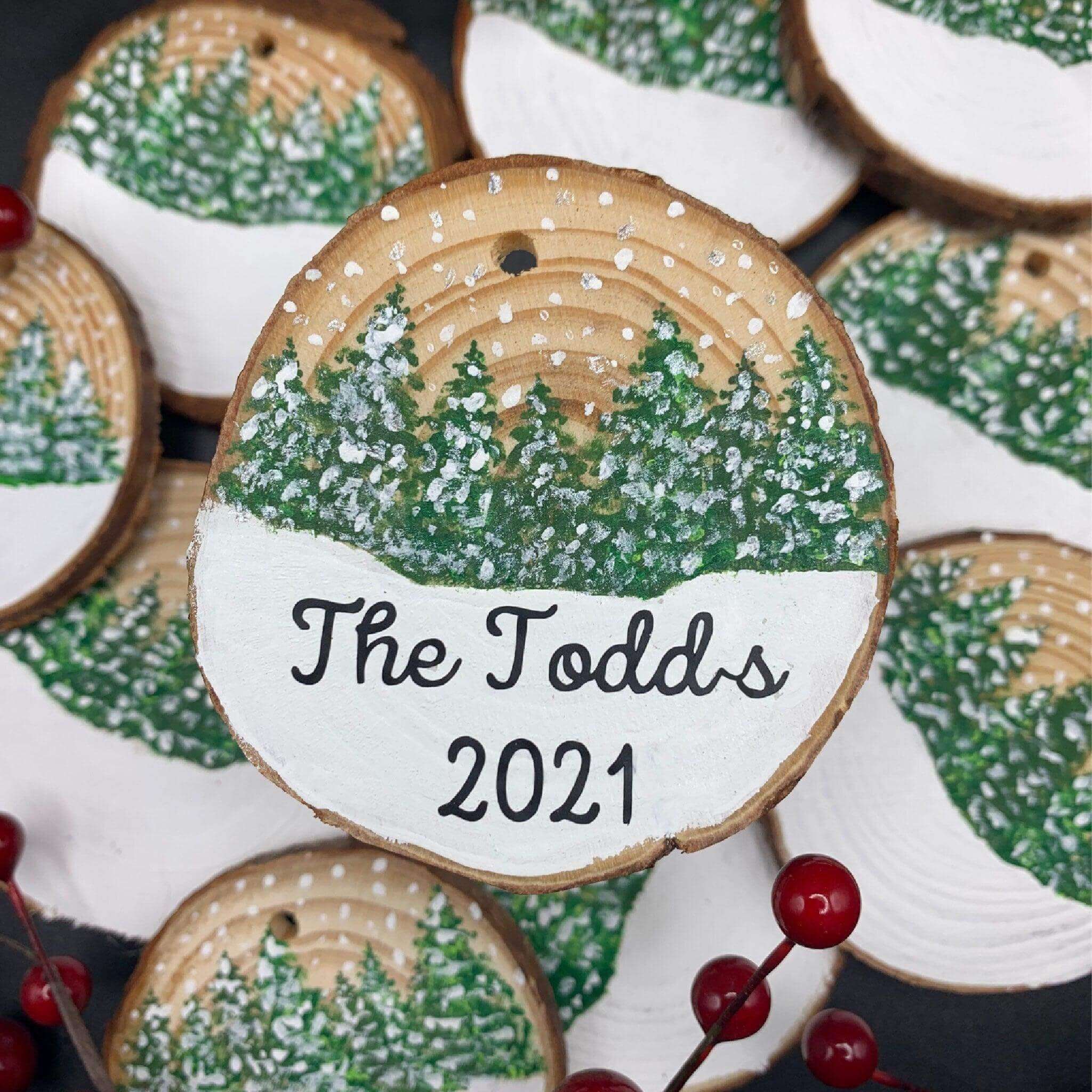 Personalized snow globe Christmas tree ornament by Winks Design Studio, LLC, featuring a festive snow scene inside a clear globe.