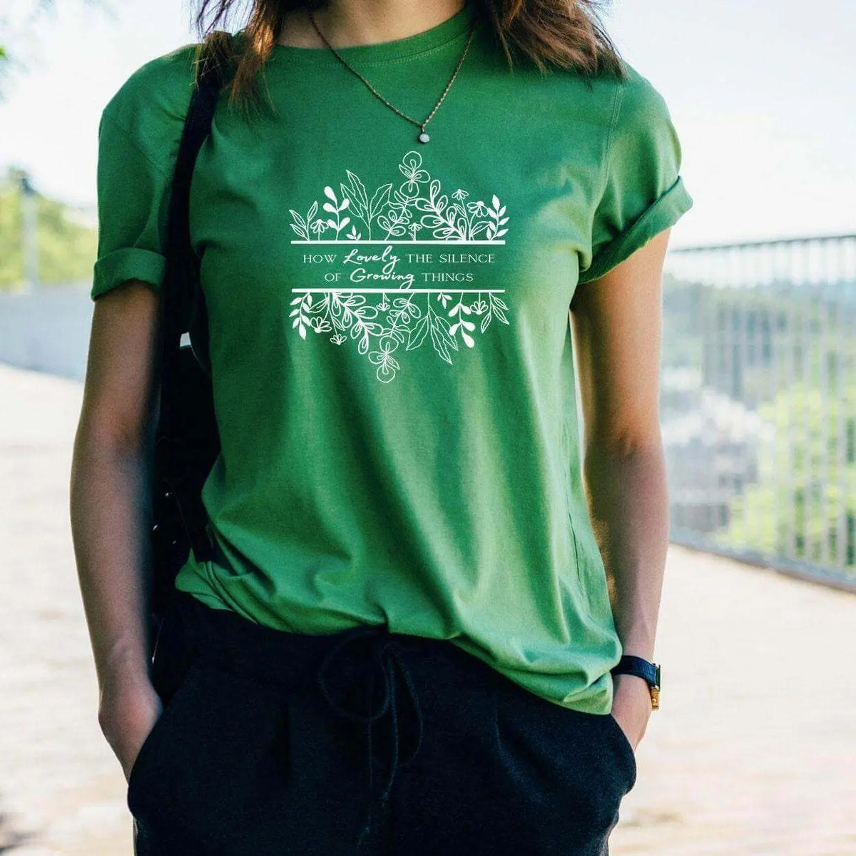Black flower print T-shirt from Winks Design Studio, LLC with "How Lovely The Silence" graphic, casual shirt for women or men.