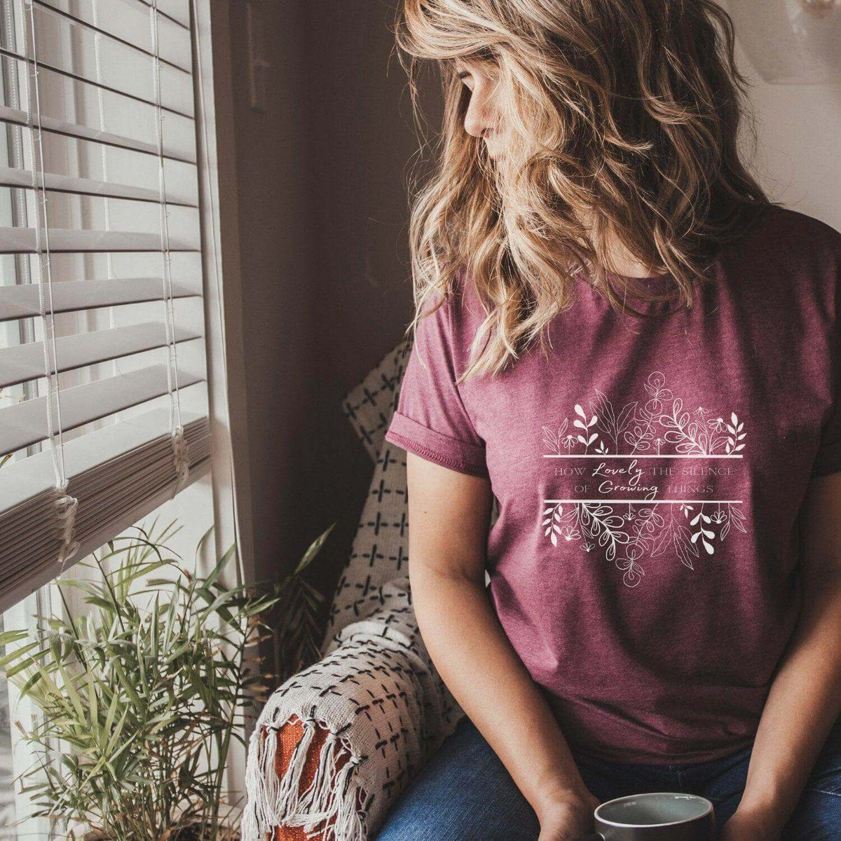 Black How Lovely The Silence flower print T-shirt from Winks Design Studio, LLC, featuring a floral design on soft cotton fabric.