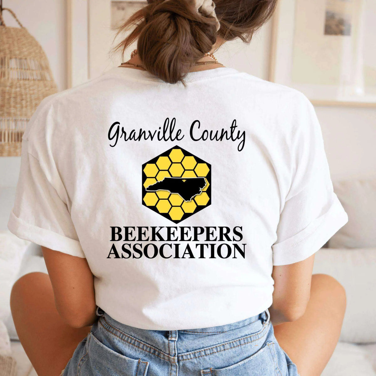 White GCBA Full Back Image T-Shirt by Winks Design Studio, LLC, featuring a detailed graphic on the back.