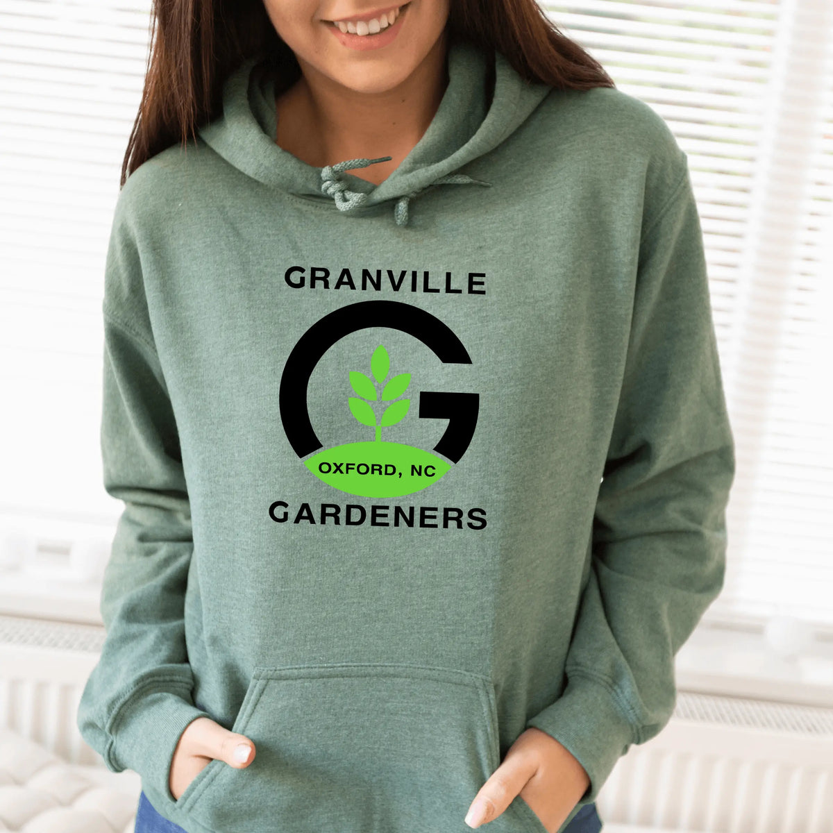 White Granville Gardeners Front Pouch Hoodie by Winks Design Studio, LLC, featuring a comfortable fit and front pouch pocket.