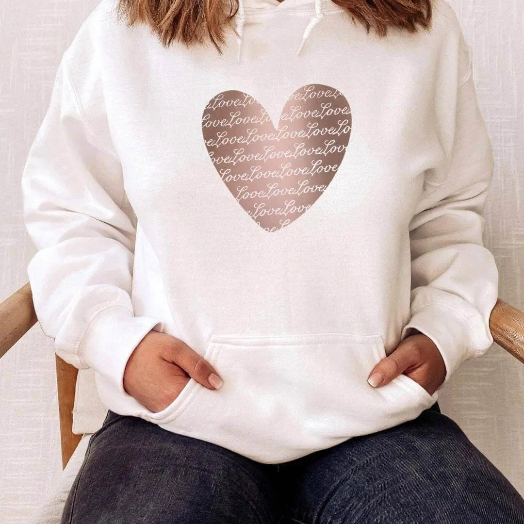 Copper Heart sweatshirt by Winks Design Studio, LLC featuring a small copper heart design on a cozy sweatshirt.