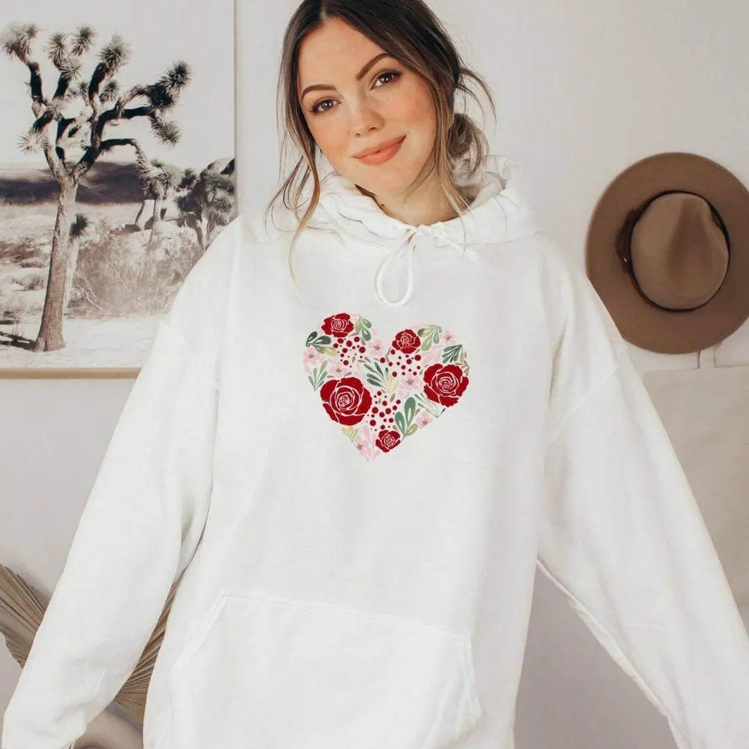 Winks Design Studio flower heart sweatshirt featuring a floral heart design on a cozy sweatshirt for women.