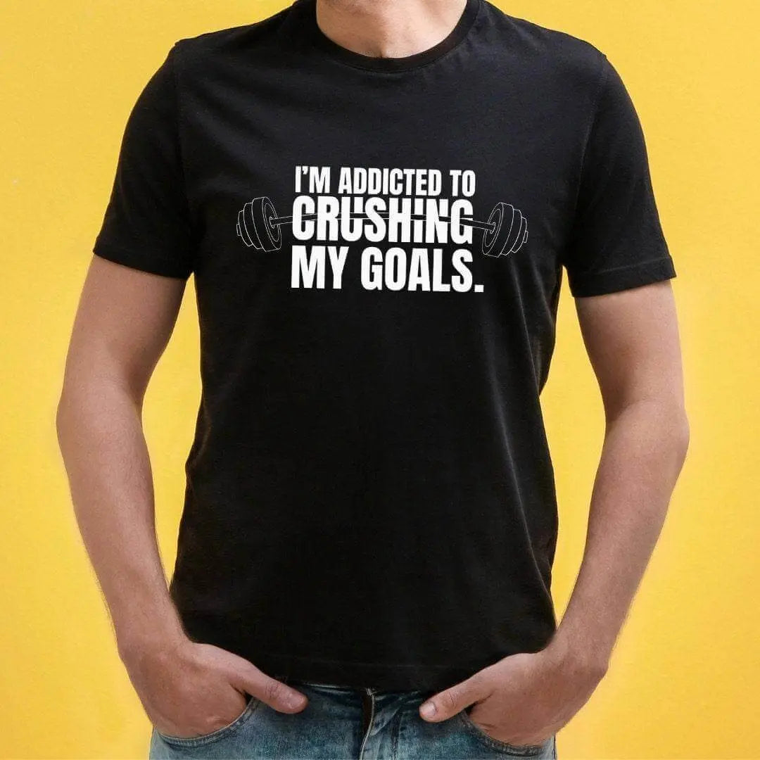 Black Crushing My Goals T-shirt by Winks Design Studio, LLC, featuring bold text and casual fit perfect for goal-oriented style.