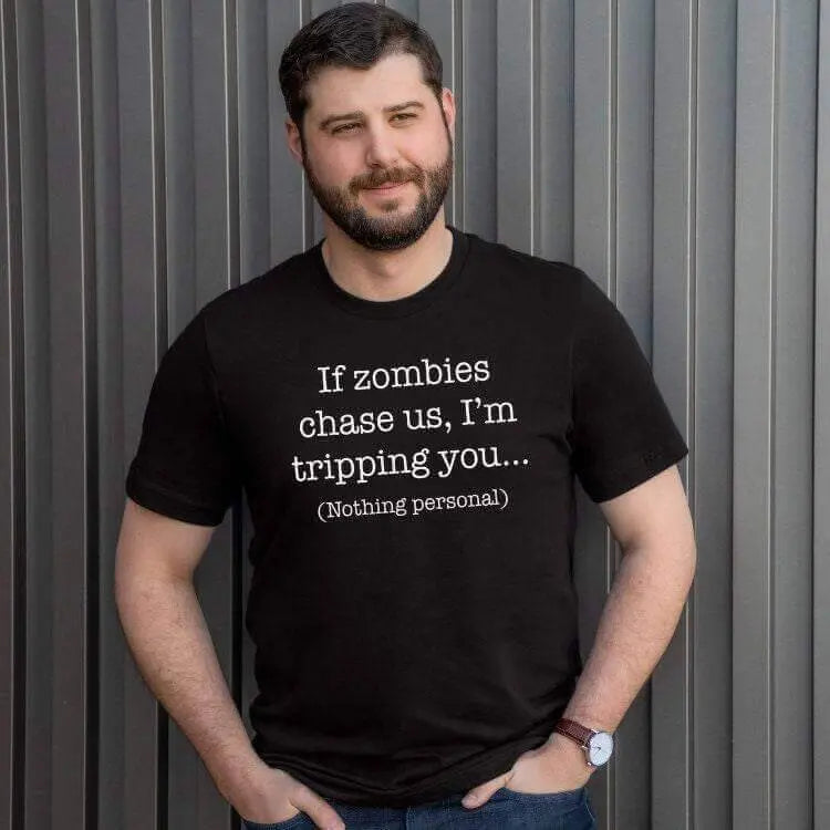 Black T-shirt from Winks Design Studio with humorous "If Zombies Chase Us I&