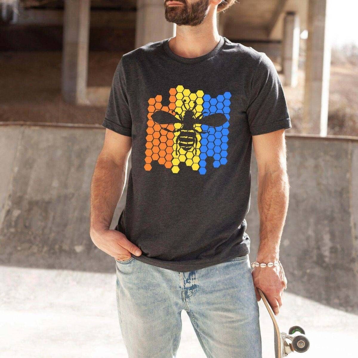 Blue Color Blocked Bee Graphic T-shirt from Winks Design Studio, LLC, featuring a vibrant bee illustration on the front.