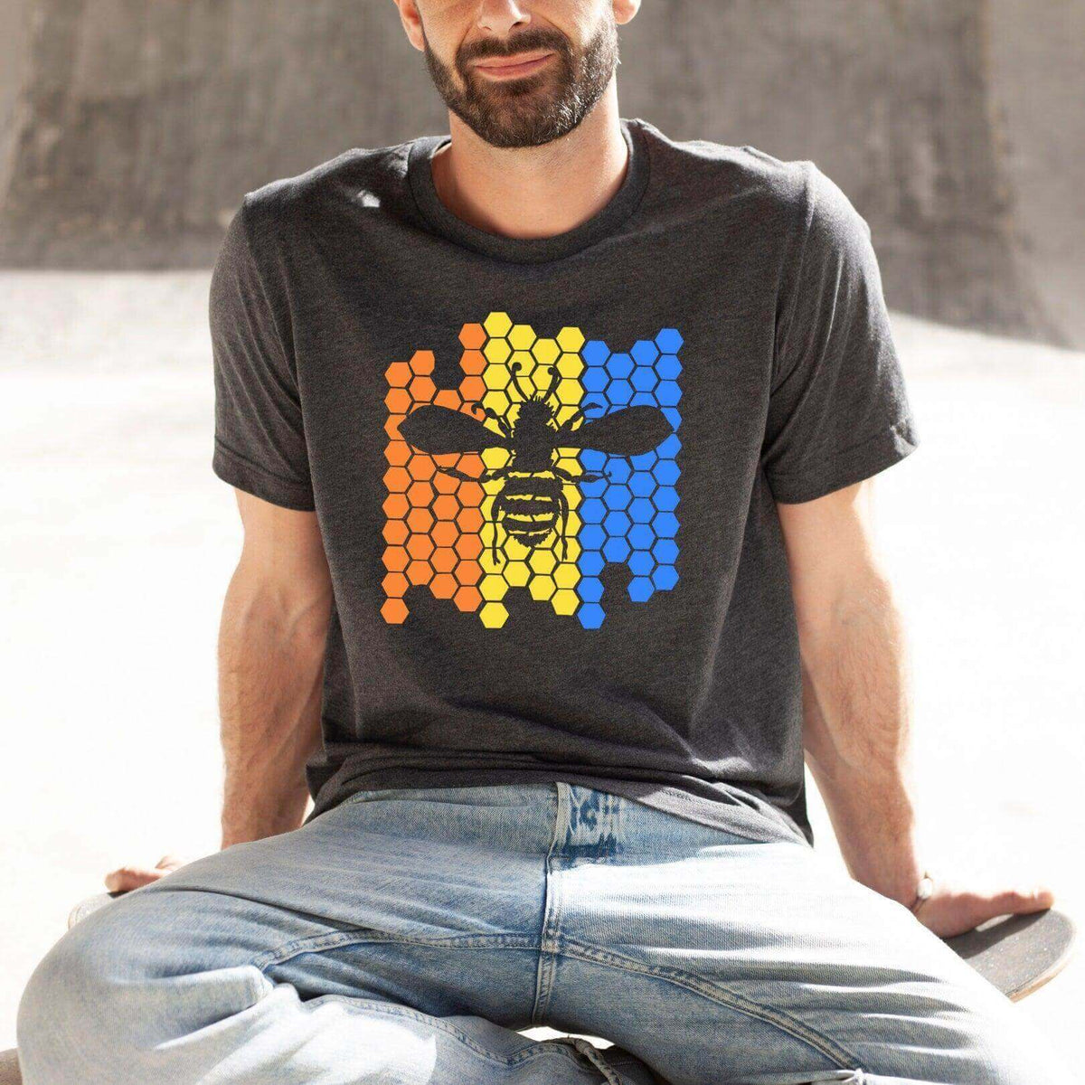 Blue Color Blocked Bee Graphic T-shirt by Winks Design Studio, LLC, featuring a vibrant bee illustration on the front.