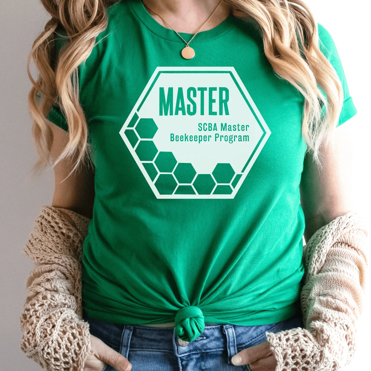 Winks Design Studio LLC SCBA Master Beekeeper Program T-shirt featuring bee and beekeeping design on black fabric.