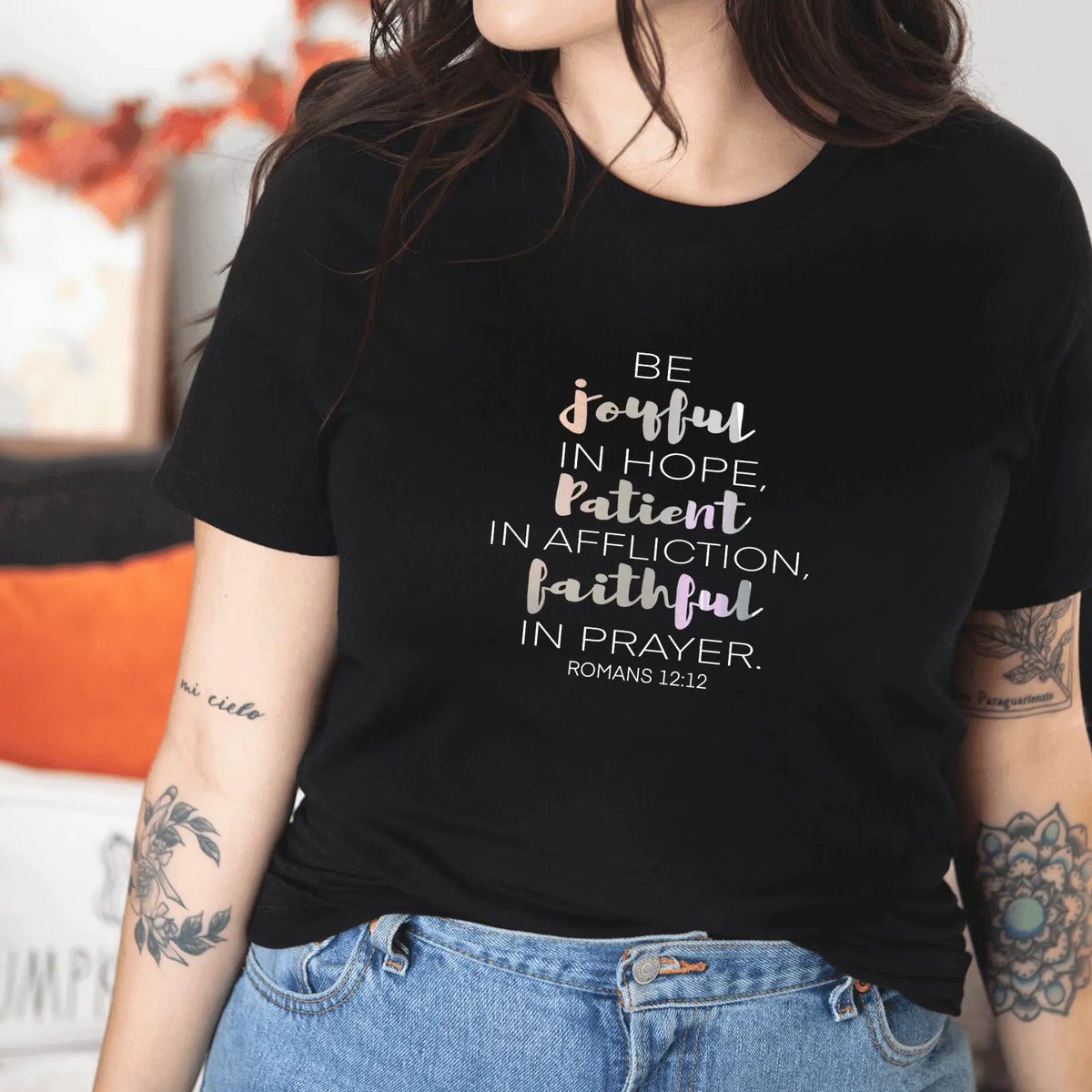 Mauve T-shirt with "Be joyful in Hope - Romans 12:12" text by Winks Design Studio, LLC, displayed on a white background.