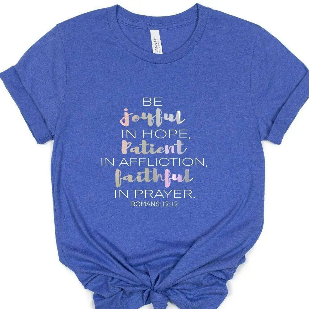 Mauve T-shirt by Winks Design Studio featuring the phrase "Be Joyful in Hope" with Romans 12:12 printed on the front.