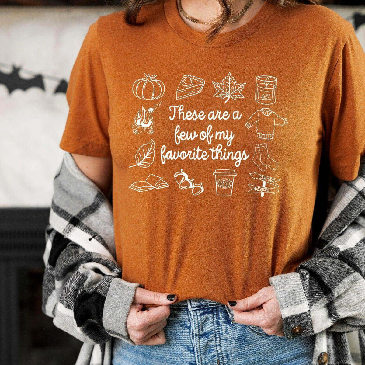 Mustard yellow Fall Favorite Things T-shirt by Winks Design Studio, LLC, featuring seasonal graphic design.