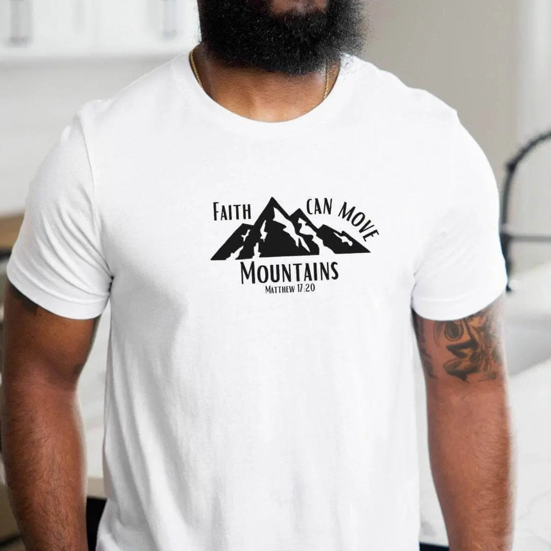 Peach Christian T-shirt by Winks Design Studio with the message "Faith Can Move Mountains" in bold lettering.
