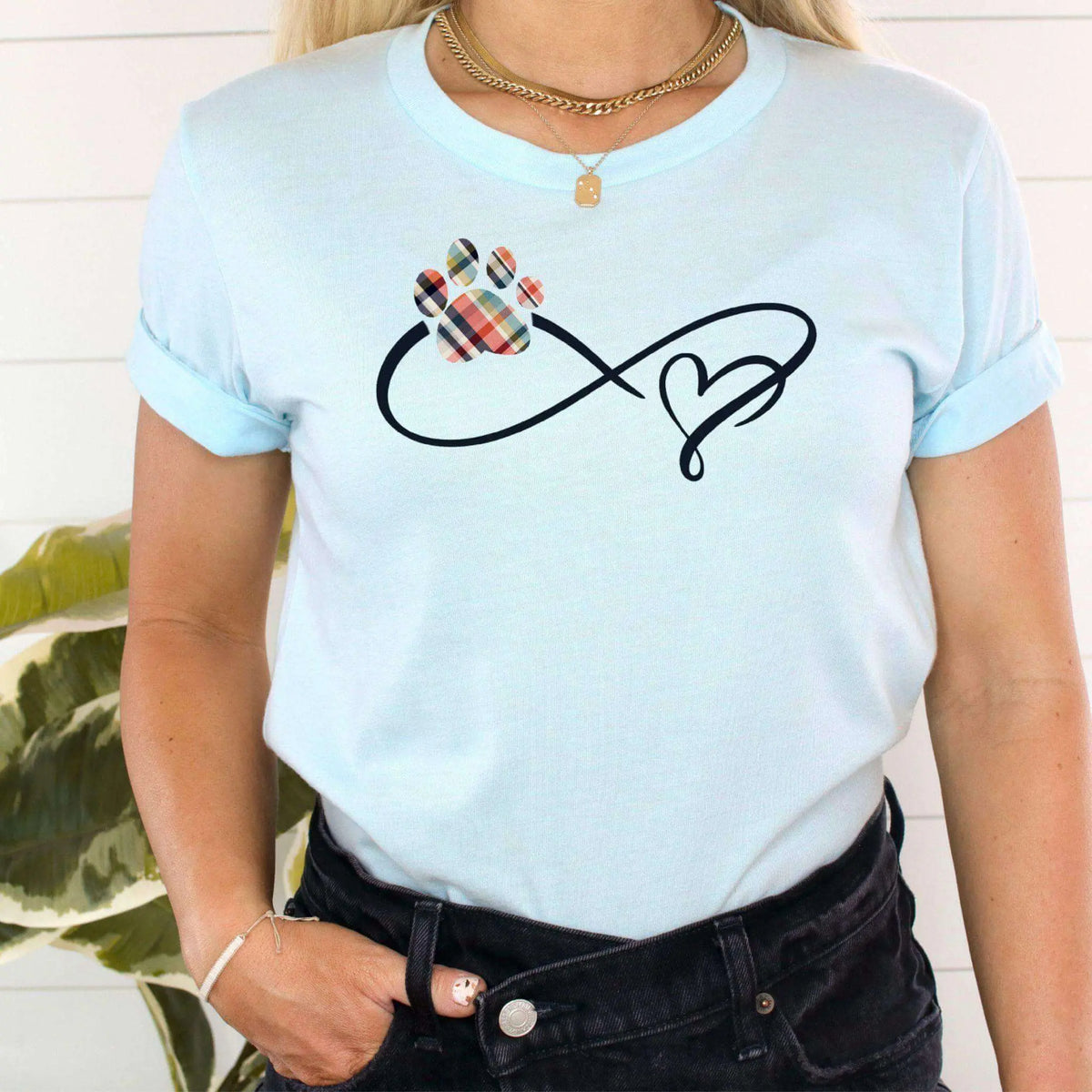 Ice blue Infinity Paw Print T-Shirt by Winks Design Studio, LLC featuring a small paw print design on soft cotton fabric.