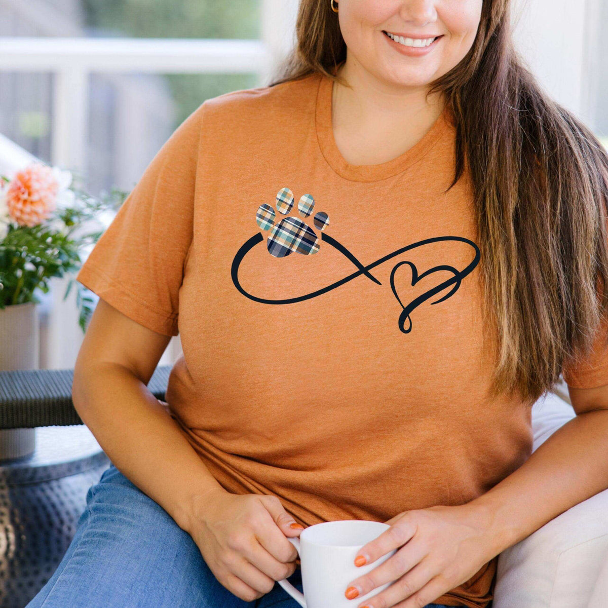 Ice blue Infinity Paw Print T-Shirt by Winks Design Studio, LLC, featuring a small paw print design on soft cotton fabric.