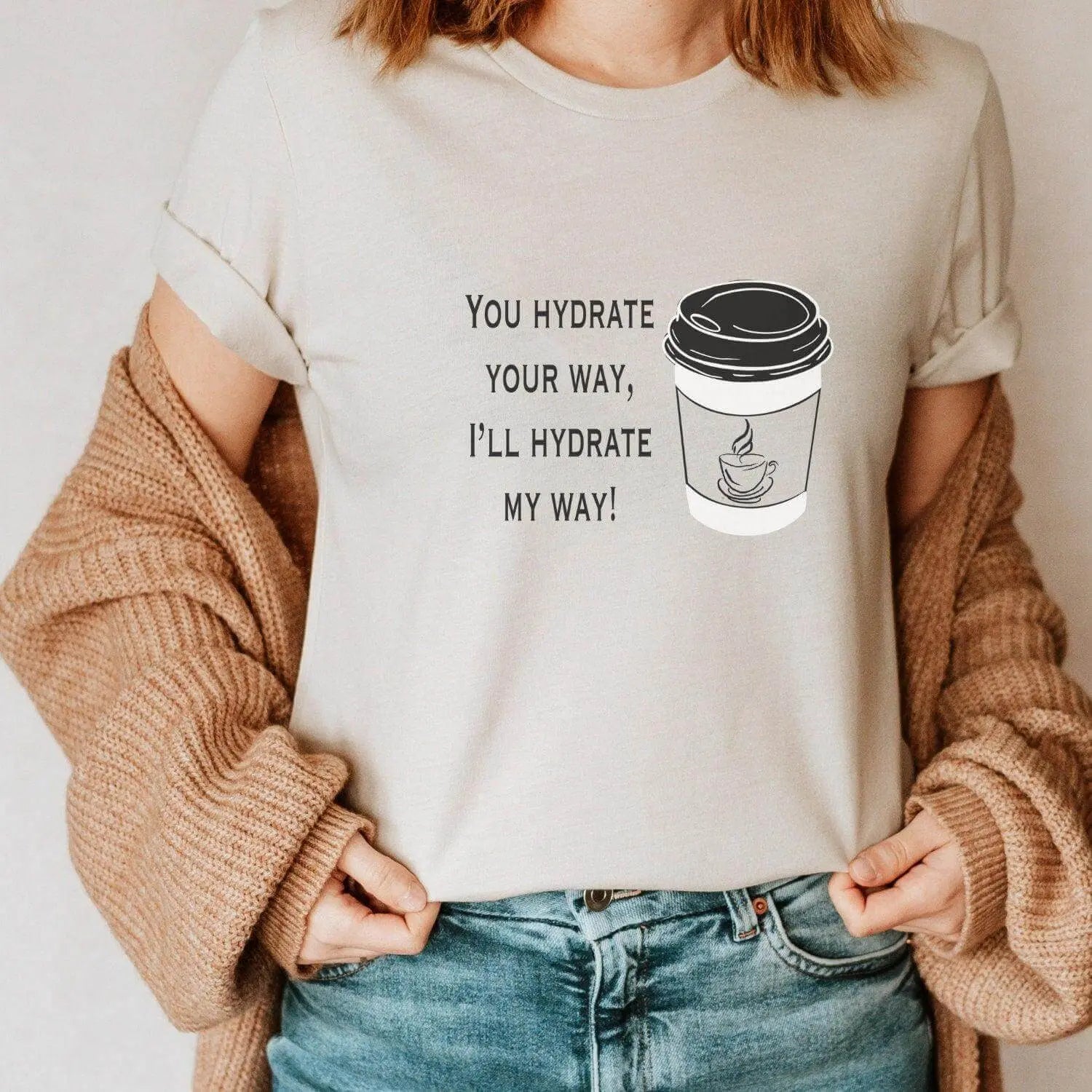 Funny coffee T-shirt by Winks Design Studio featuring humorous text "You Hydrate Your Way" on a casual cotton tee.