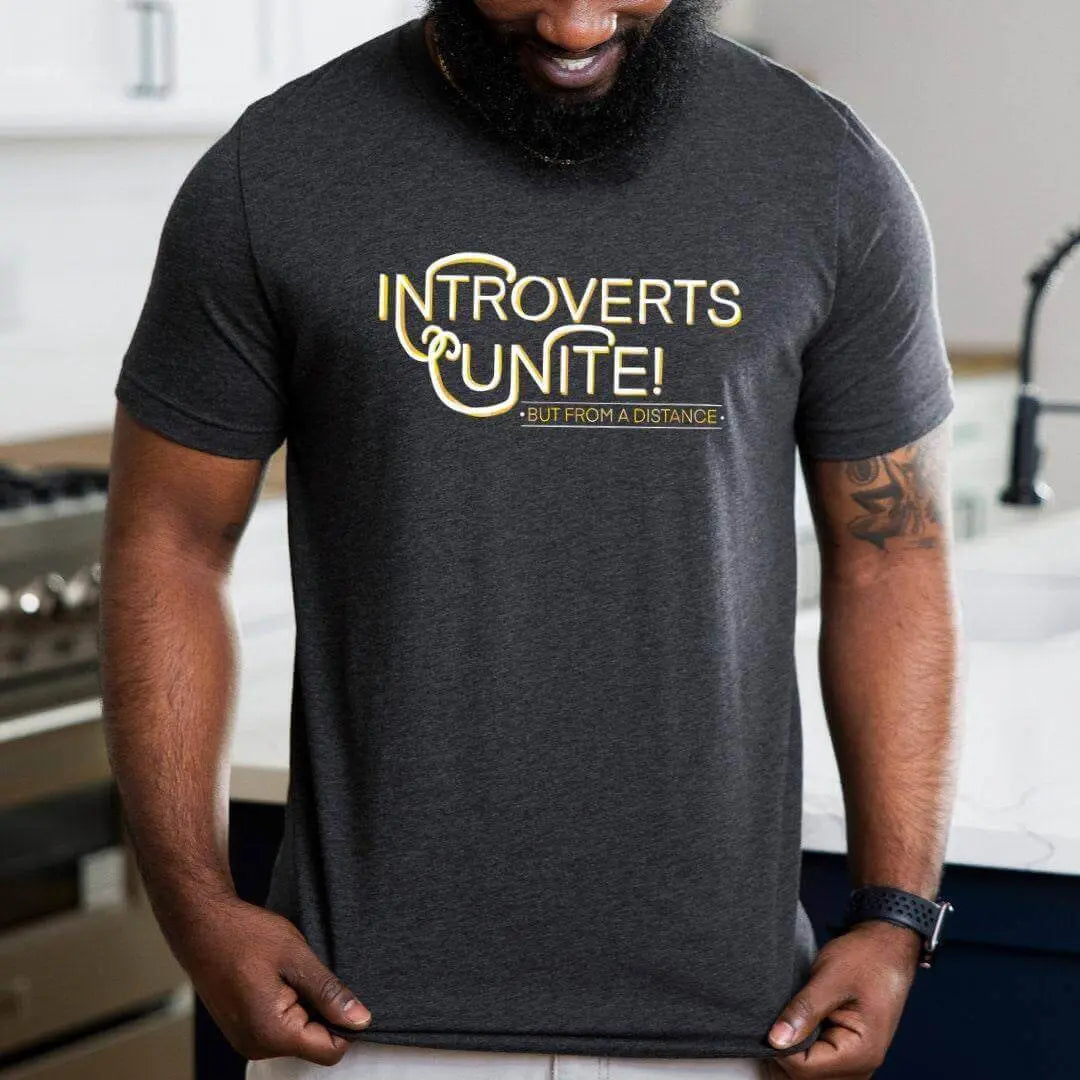 Winks Design Studio LLC introverts unite T-shirt featuring a casual fit with bold printed text on soft fabric.