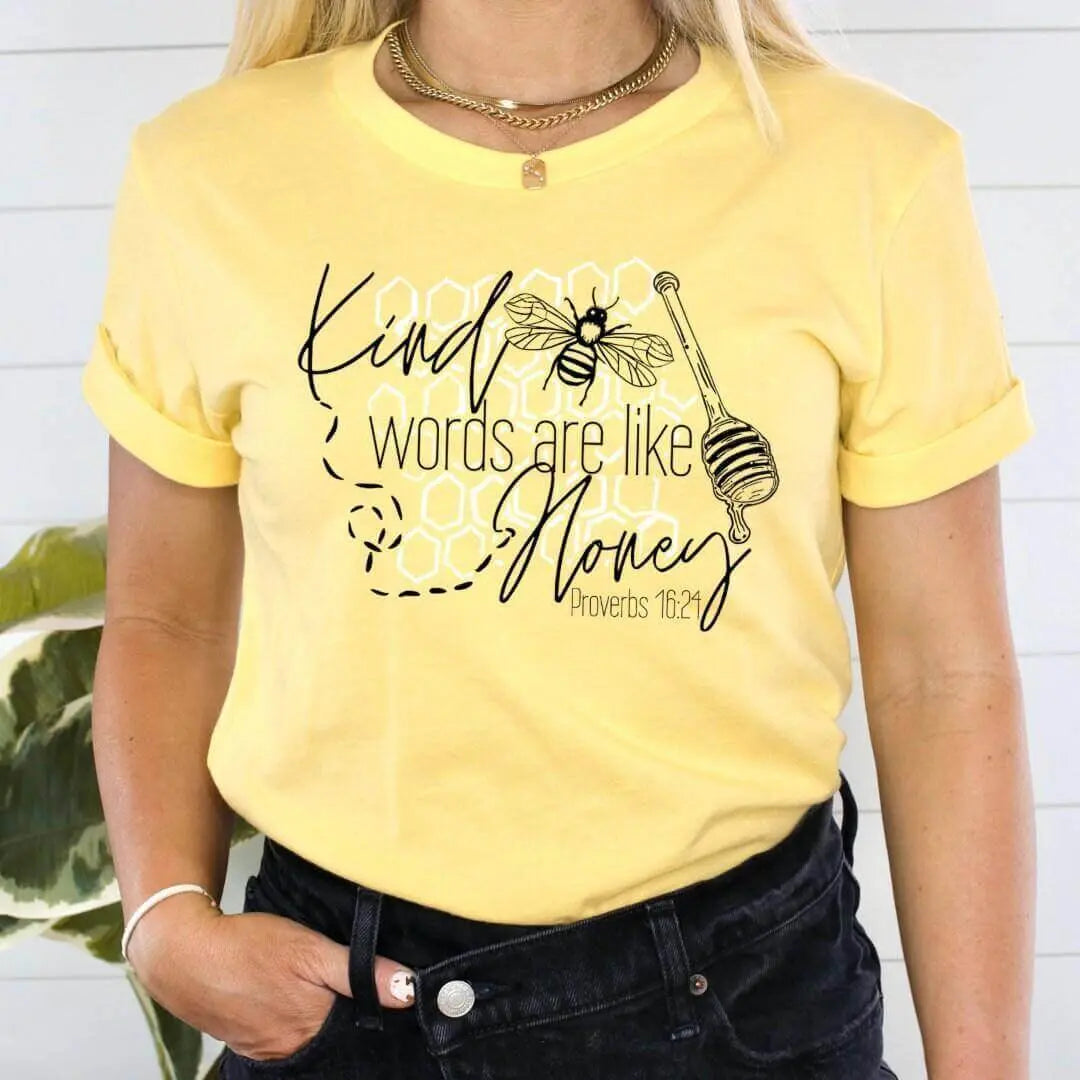 Kind Words Are Like Honey Proverbs 16:24 T-shirt by Winks Design Studio, LLC with a honey-themed design and uplifting message.