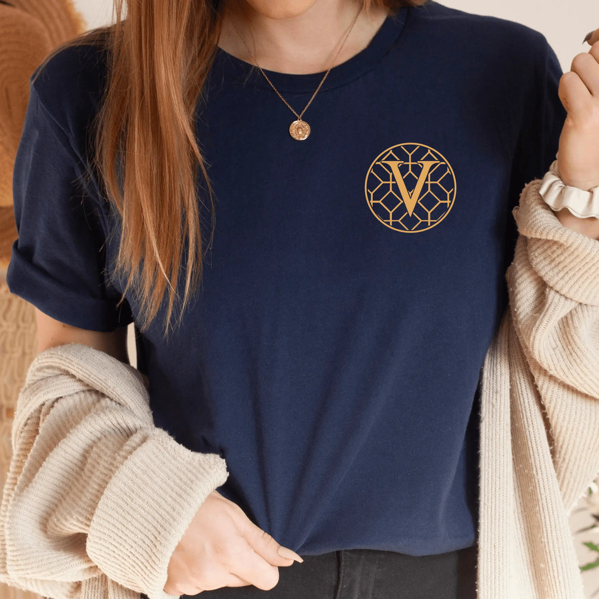 Navy blue Verdigris T-shirt by Winks Design Studio, LLC, featuring a small graphic on the chest area.