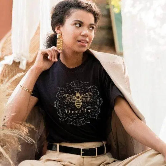 Winks Design Studio Queen Bee T-Shirt featuring a bee graphic on a casual cotton tee, perfect for bee lovers.