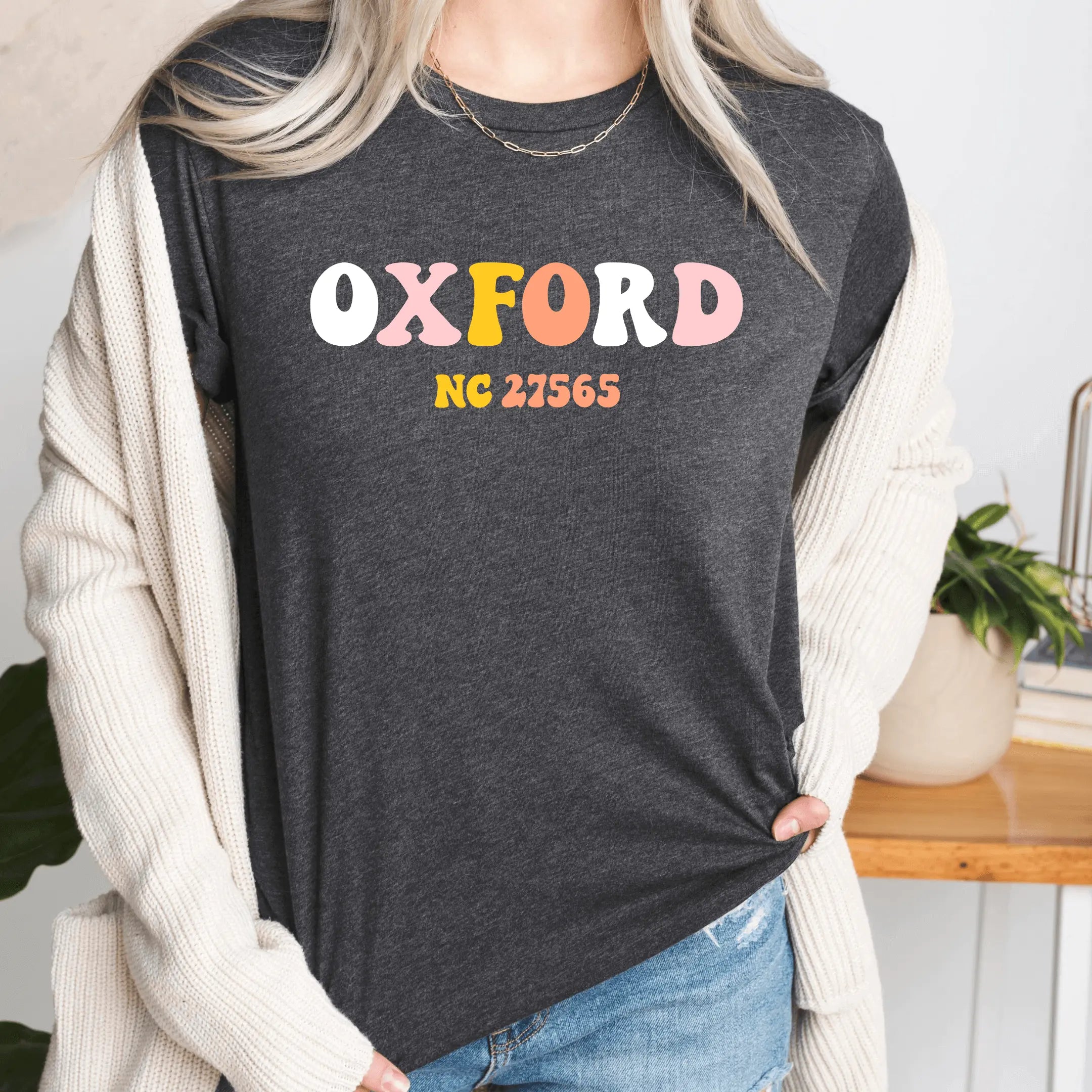 Retro Oxford T-shirt by Winks Design Studio, LLC, featuring a classic Oxford-style T-shirt with vintage-inspired design and comfortable fit.