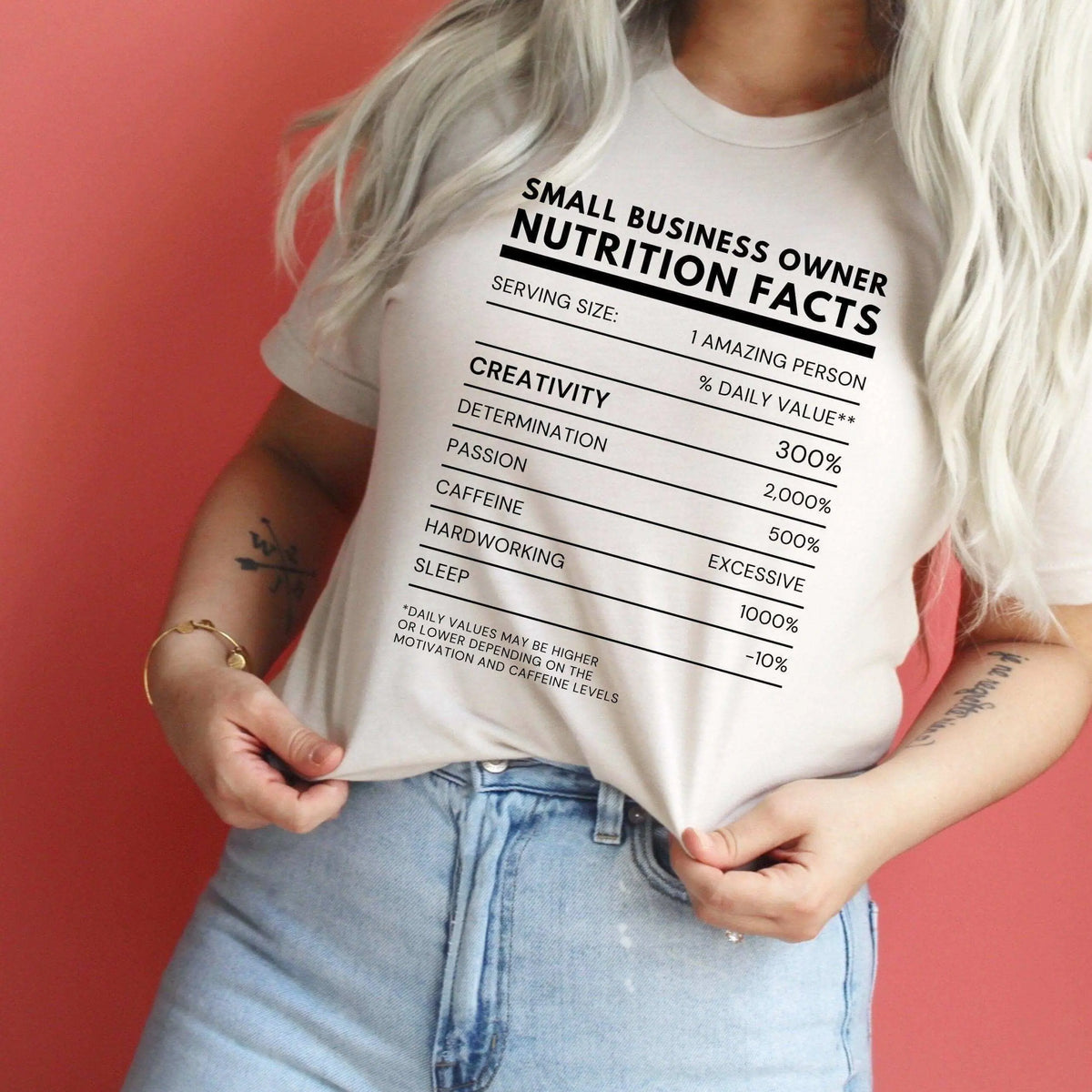 Small Business Owner Nutrition Facts T-shirt by Winks Design Studio, LLC, featuring a colorful nutrition facts label on a casual T-shirt.