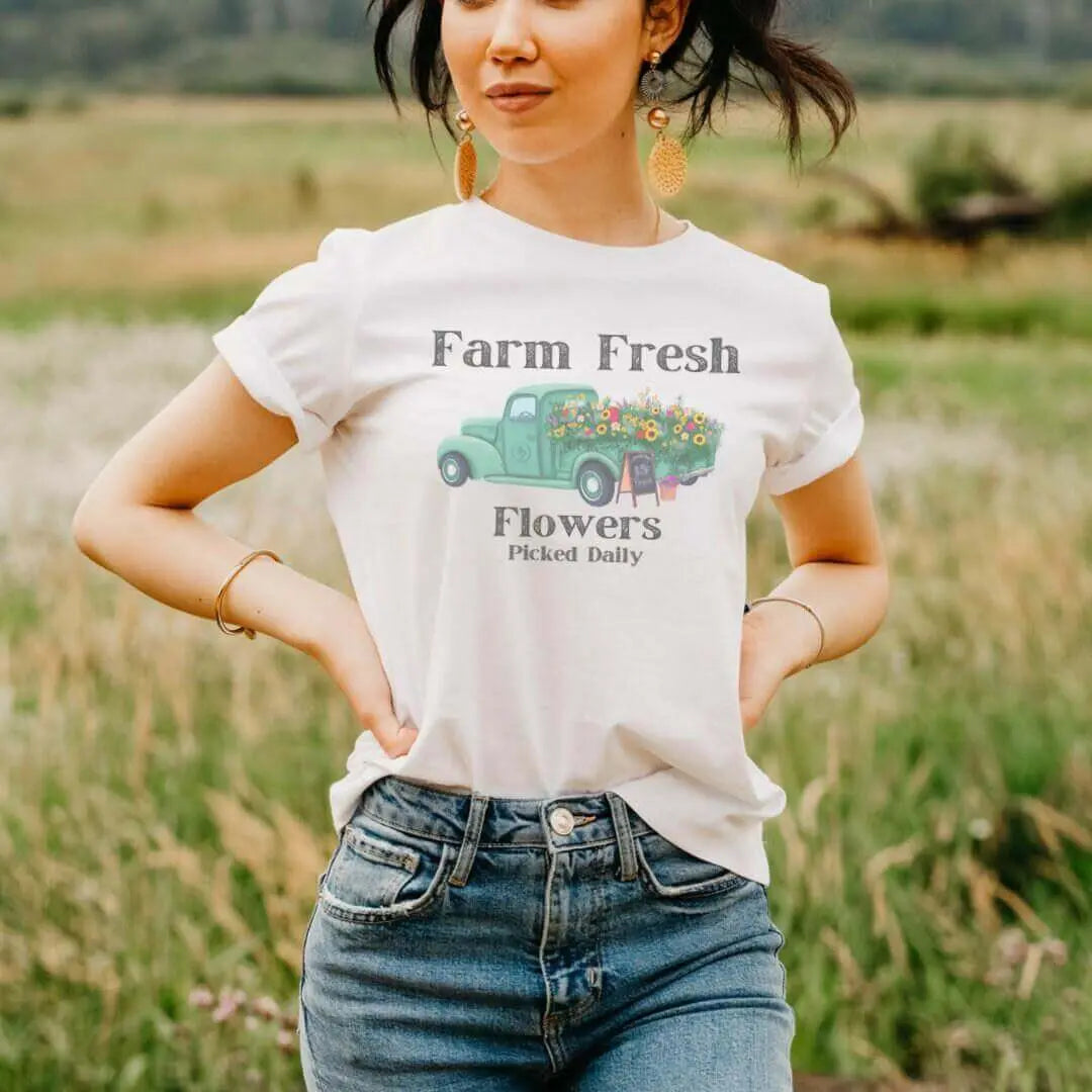 Vintage flower truck T-shirt by Winks Design Studio, LLC, featuring a colorful floral truck graphic on a casual T-shirt.