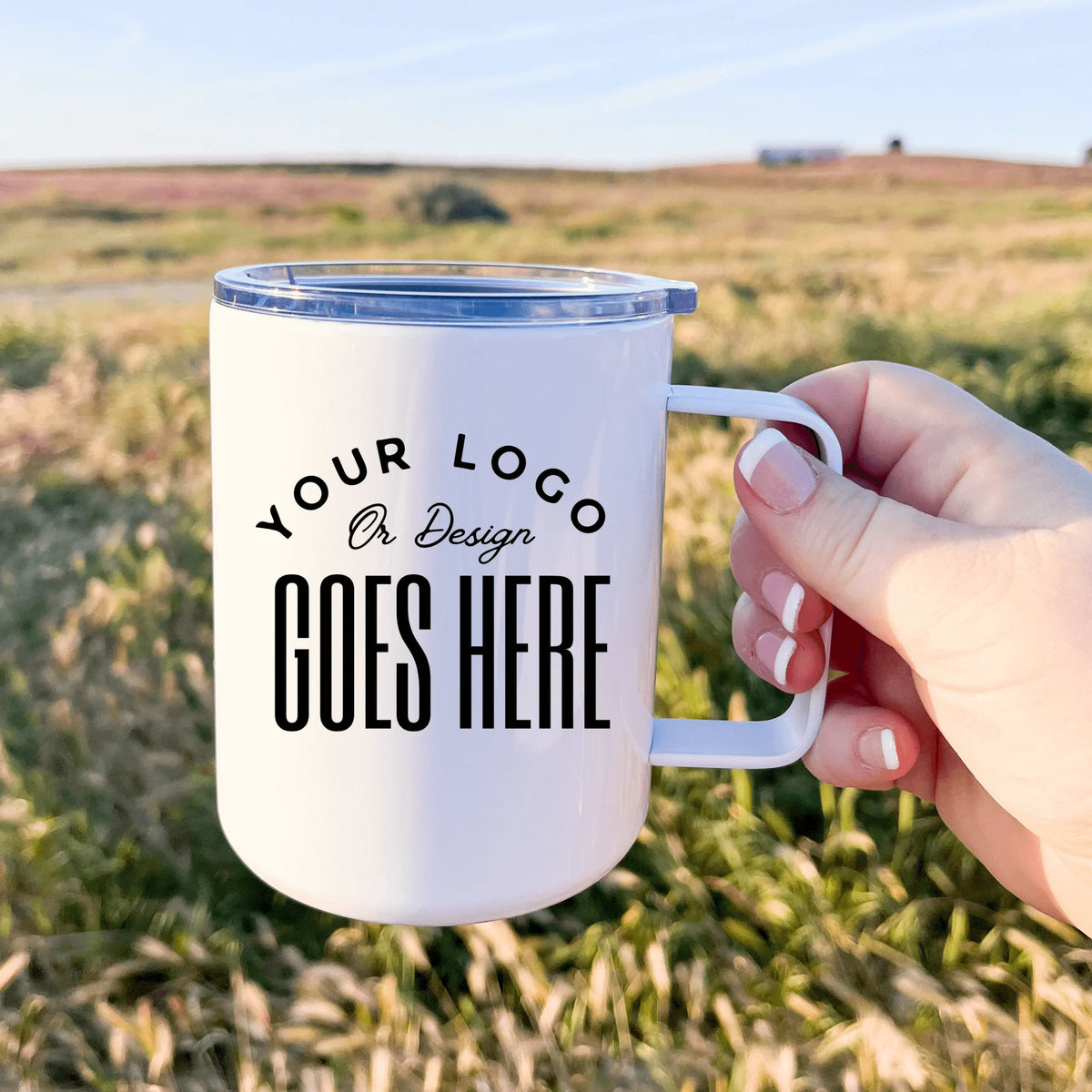 Custom 13oz metal travel tumbler by Winks Design Studio, LLC, showing a sleek stainless steel mug with a lid for on-the-go use.